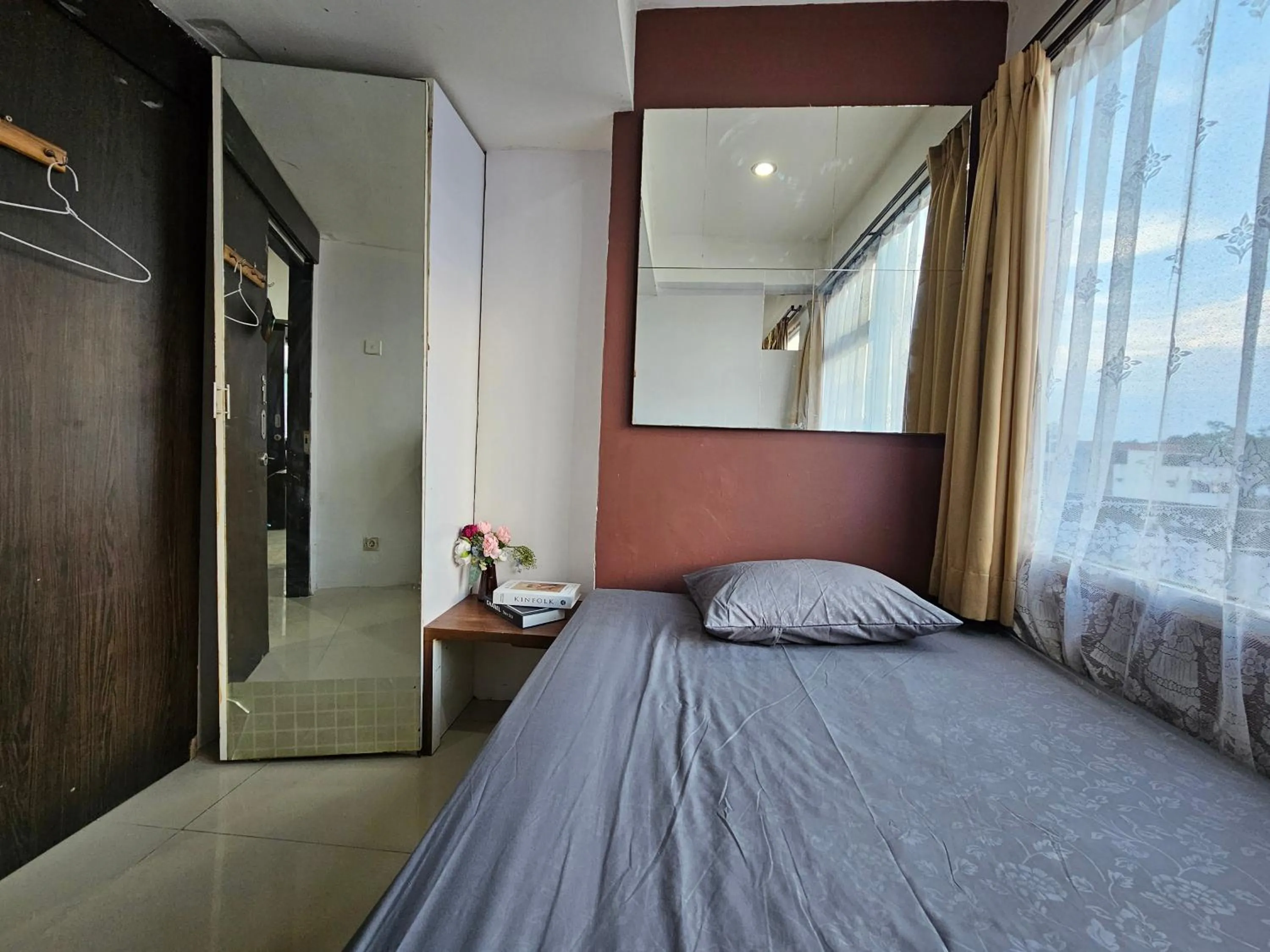 Bed in The Jarrdin Apartment Hotels by Ironman