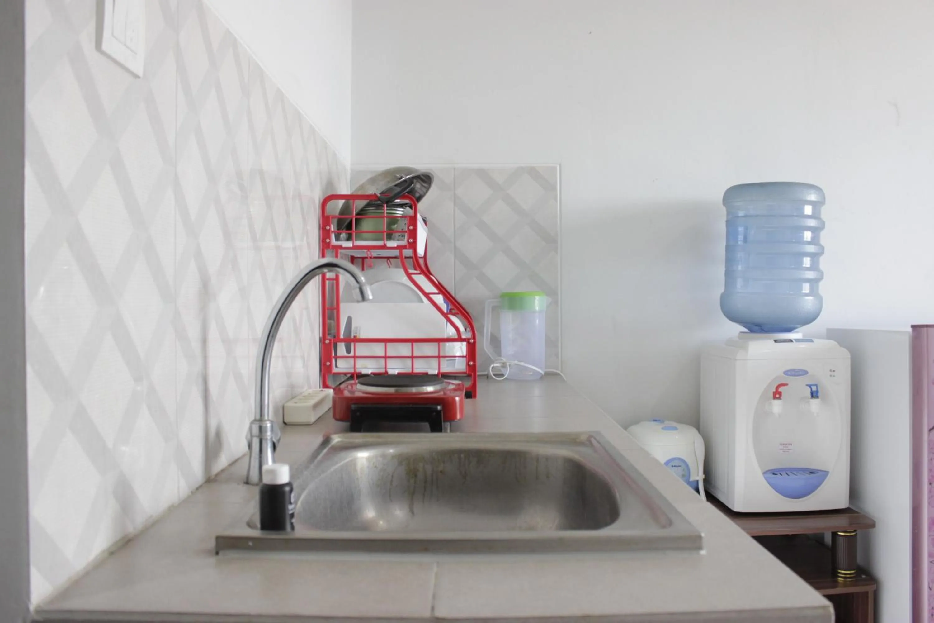 Comfy 2BR Apartment at Mekarwangi Square Cibaduyut By Travelio