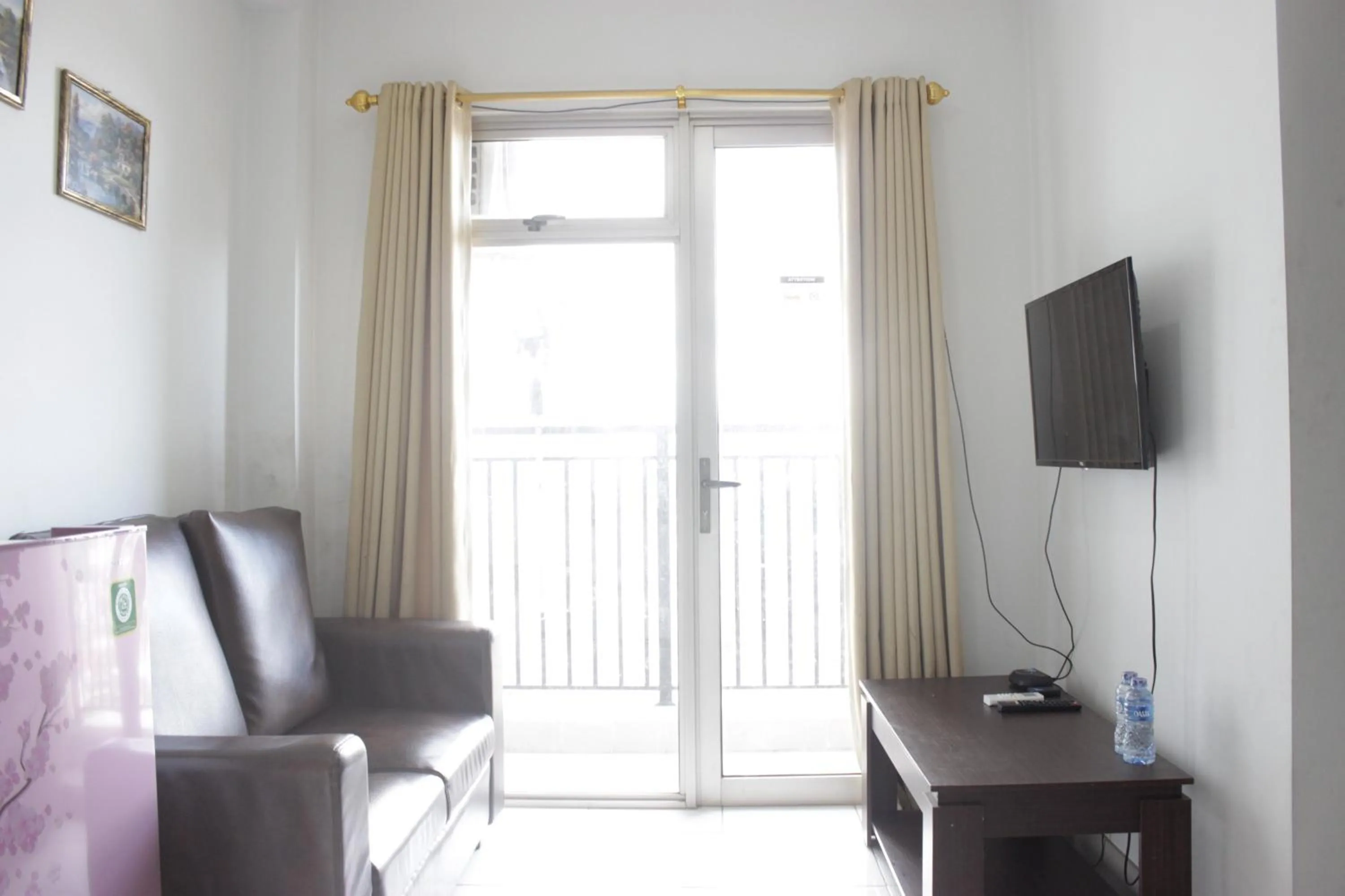 Comfy 2BR Apartment at Mekarwangi Square Cibaduyut By Travelio