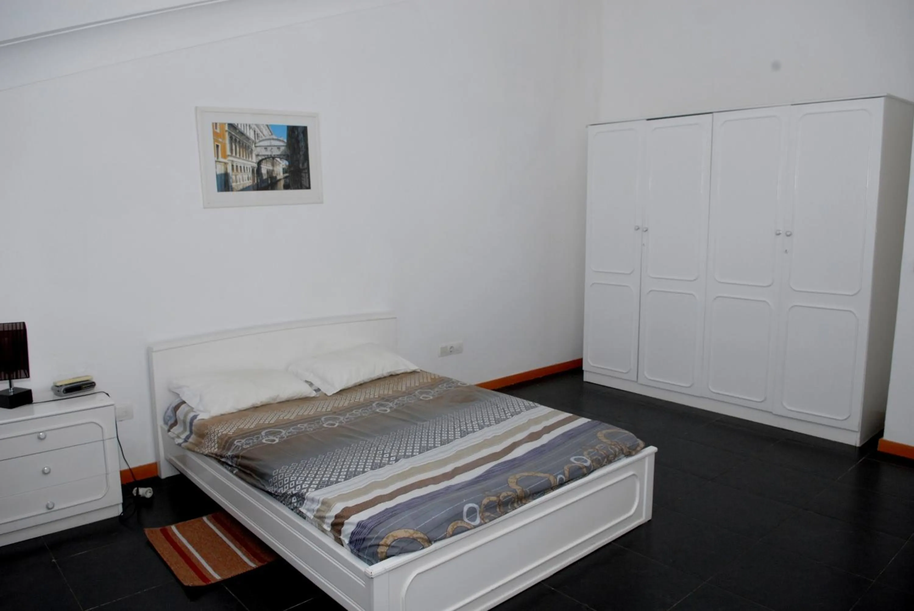 Photo of the whole room, Bed in Apartamentos Santiago - Praia