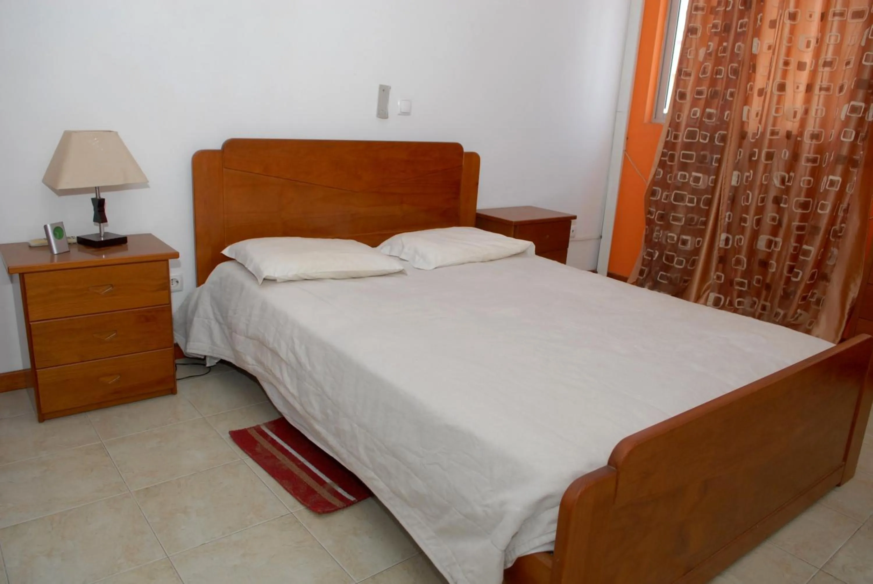 Photo of the whole room, Bed in Apartamentos Santiago - Praia