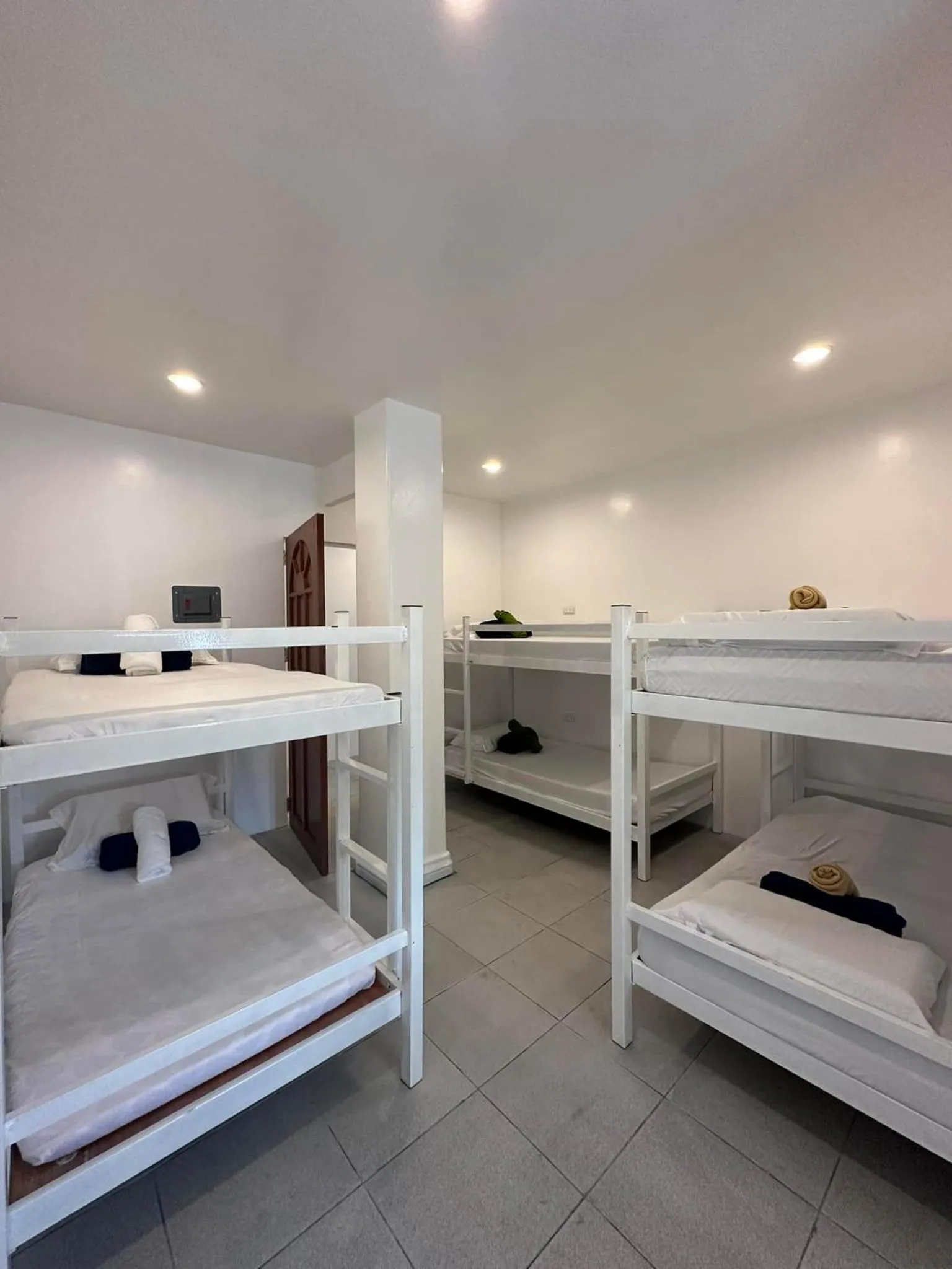 Bed in Gracey Dive Resort and Restaurant