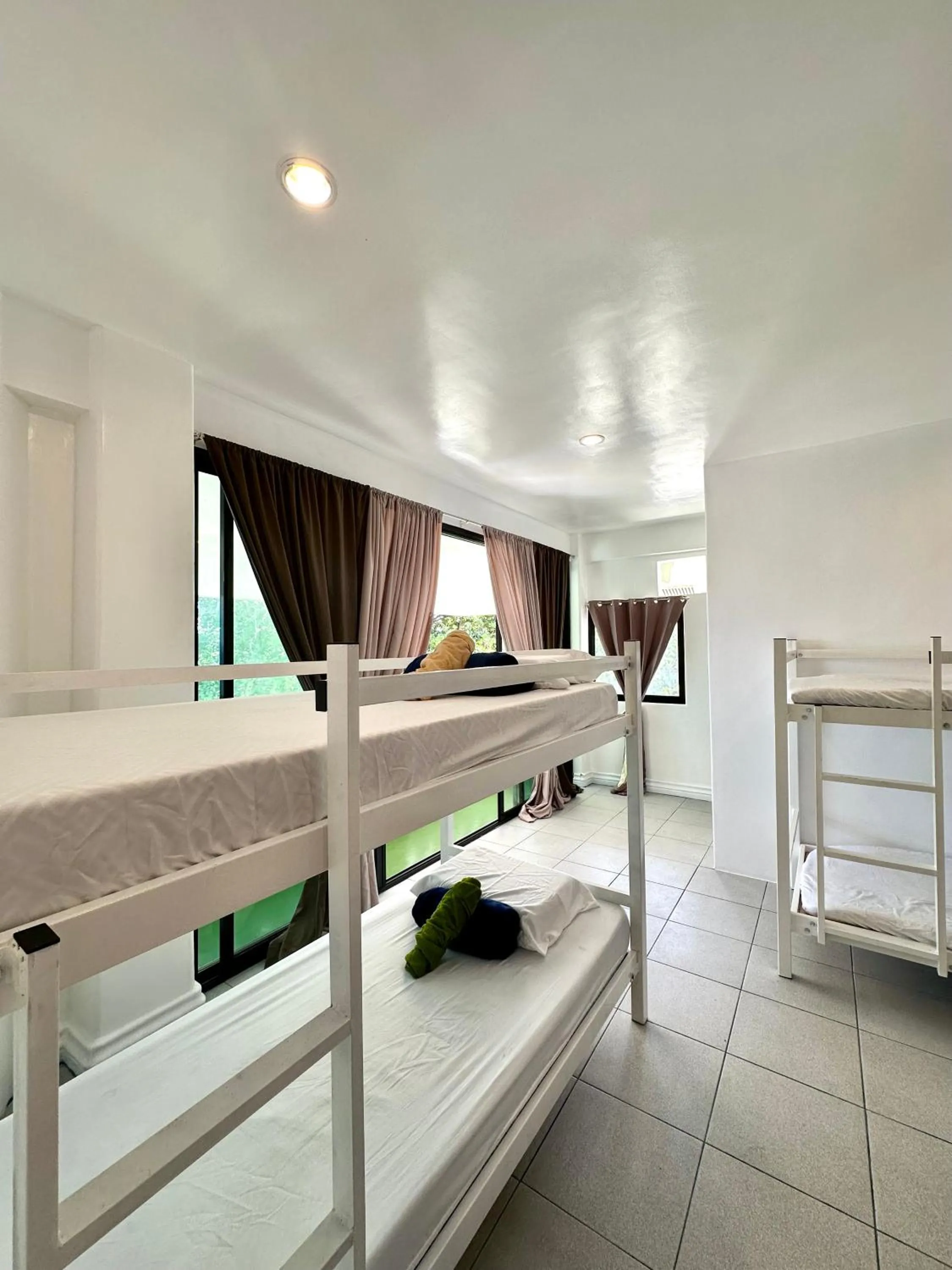 Bed in Gracey Dive Resort and Restaurant