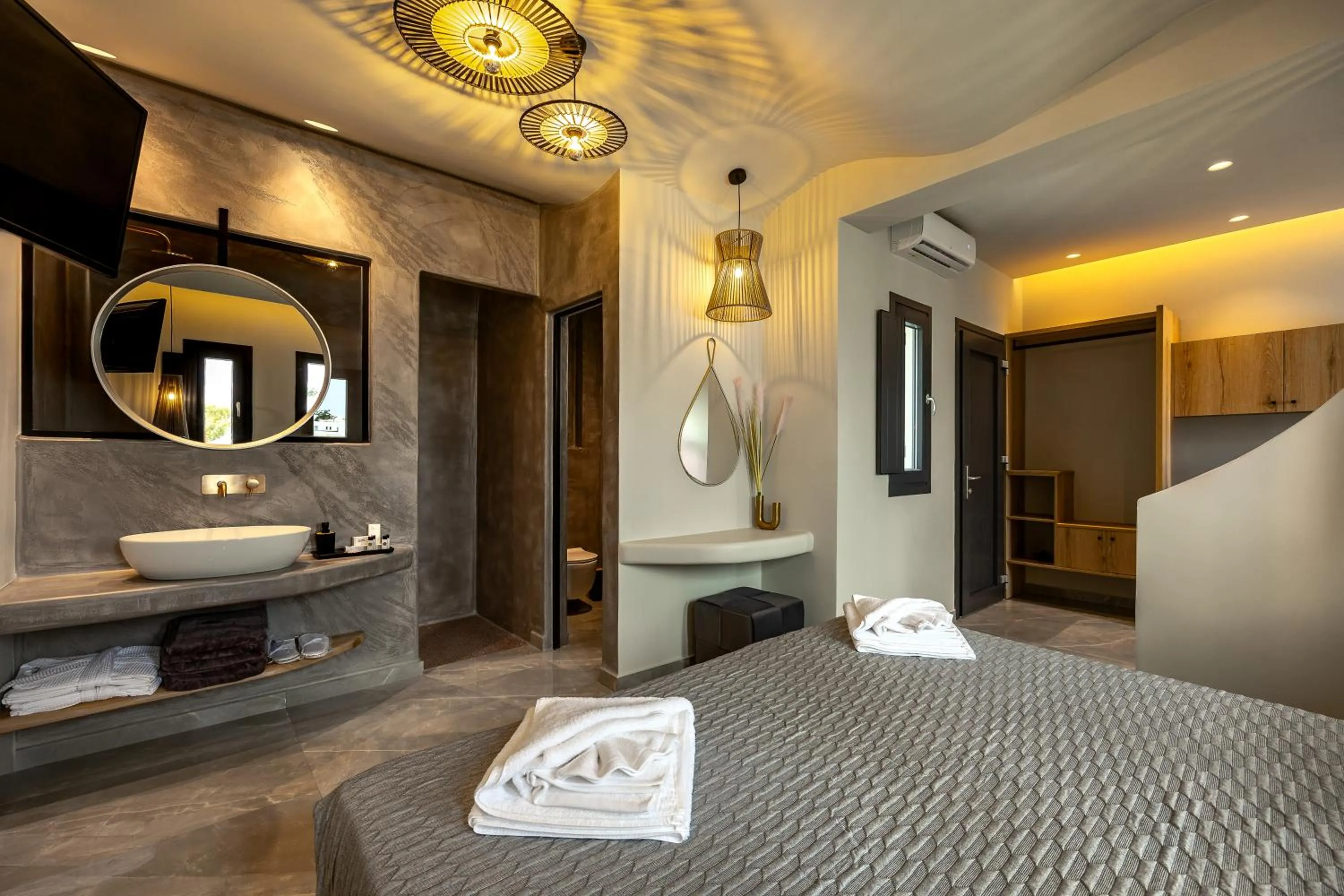 Bed in Kudos Suites Firostefani
