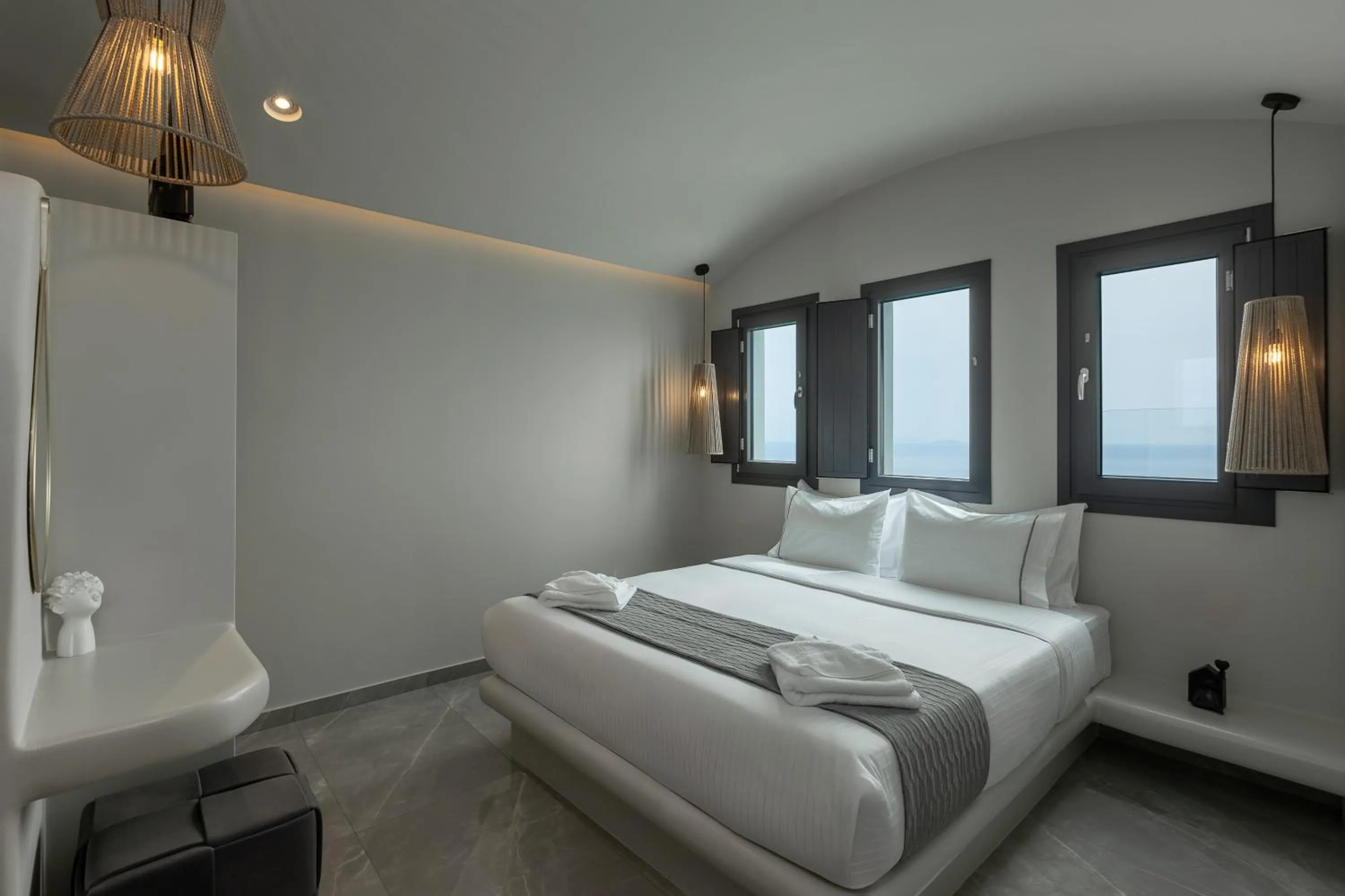 Bed in Kudos Suites Firostefani