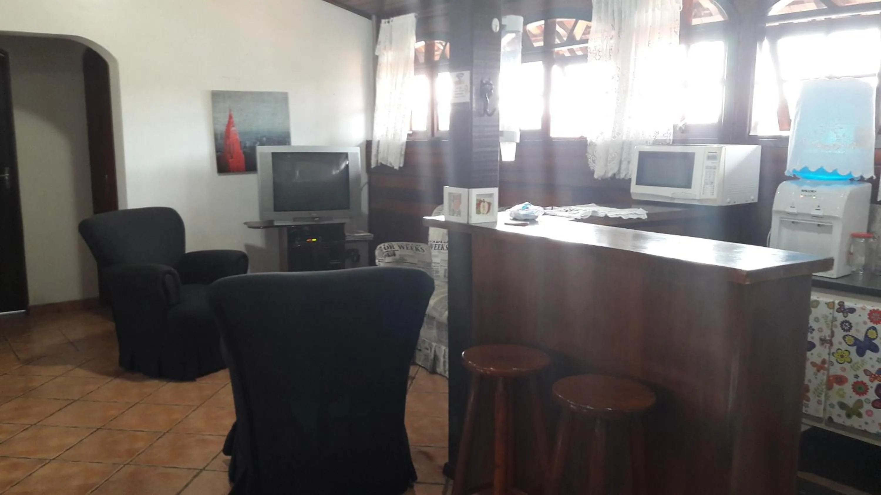 Communal lounge/ TV room in Pousada Sognares