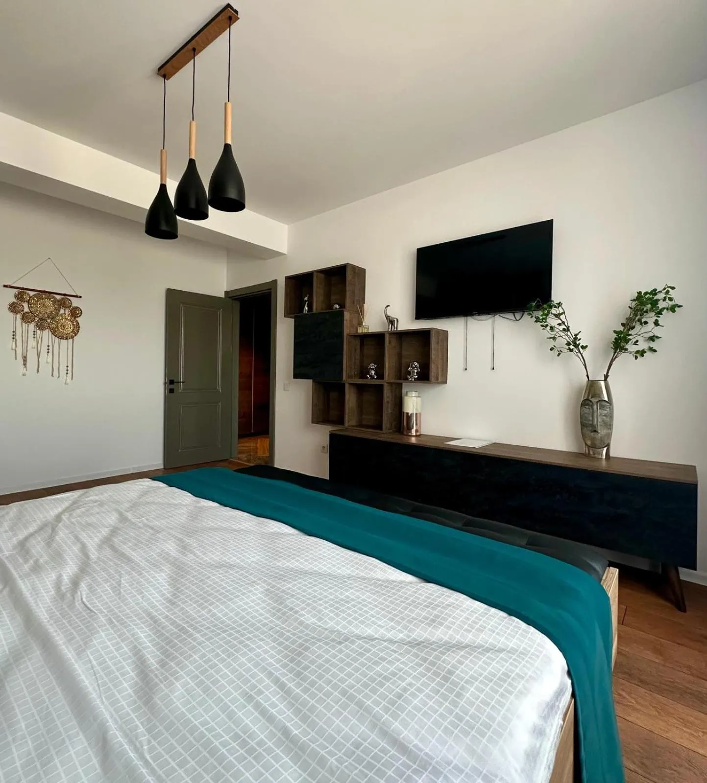 Bed in Anto Apartments