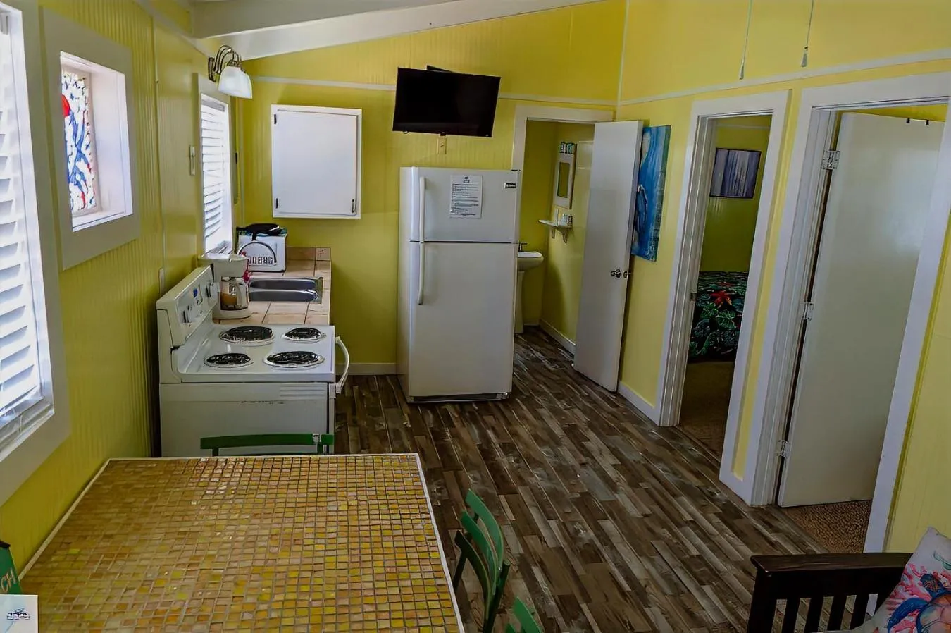 Kitchen or kitchenette in Blue Dolphin Inn and Cottages