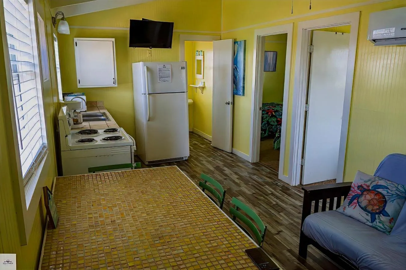 Kitchen or kitchenette in Blue Dolphin Inn and Cottages