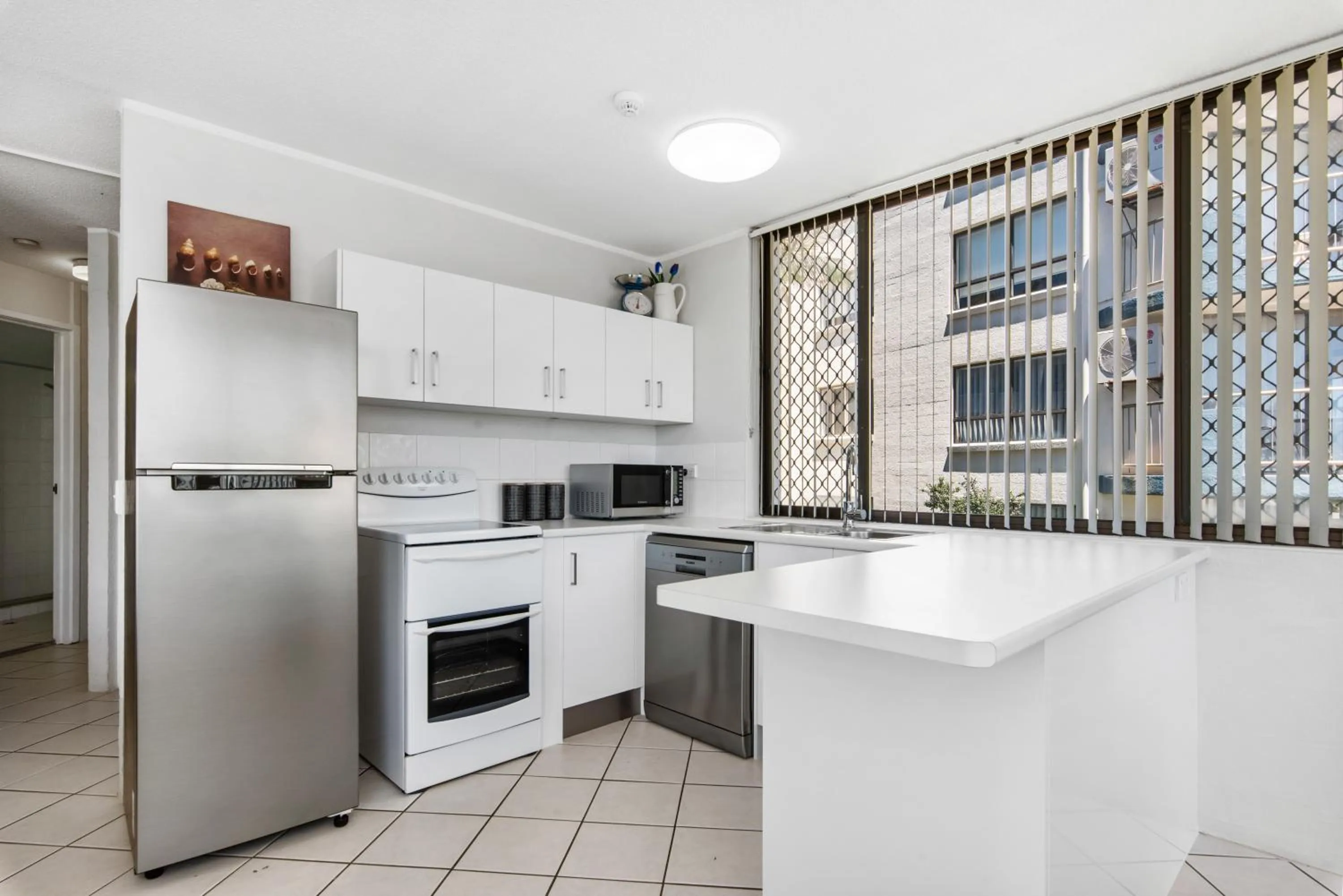 Kitchen or kitchenette in Mylos Holiday Apartments