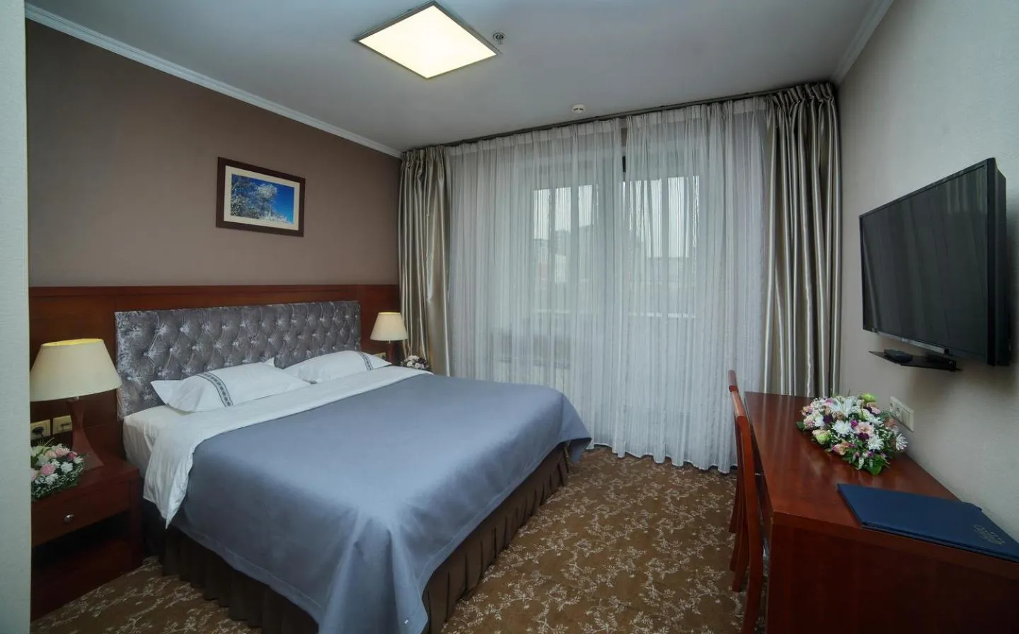 Bed in Grand Voyage Hotel