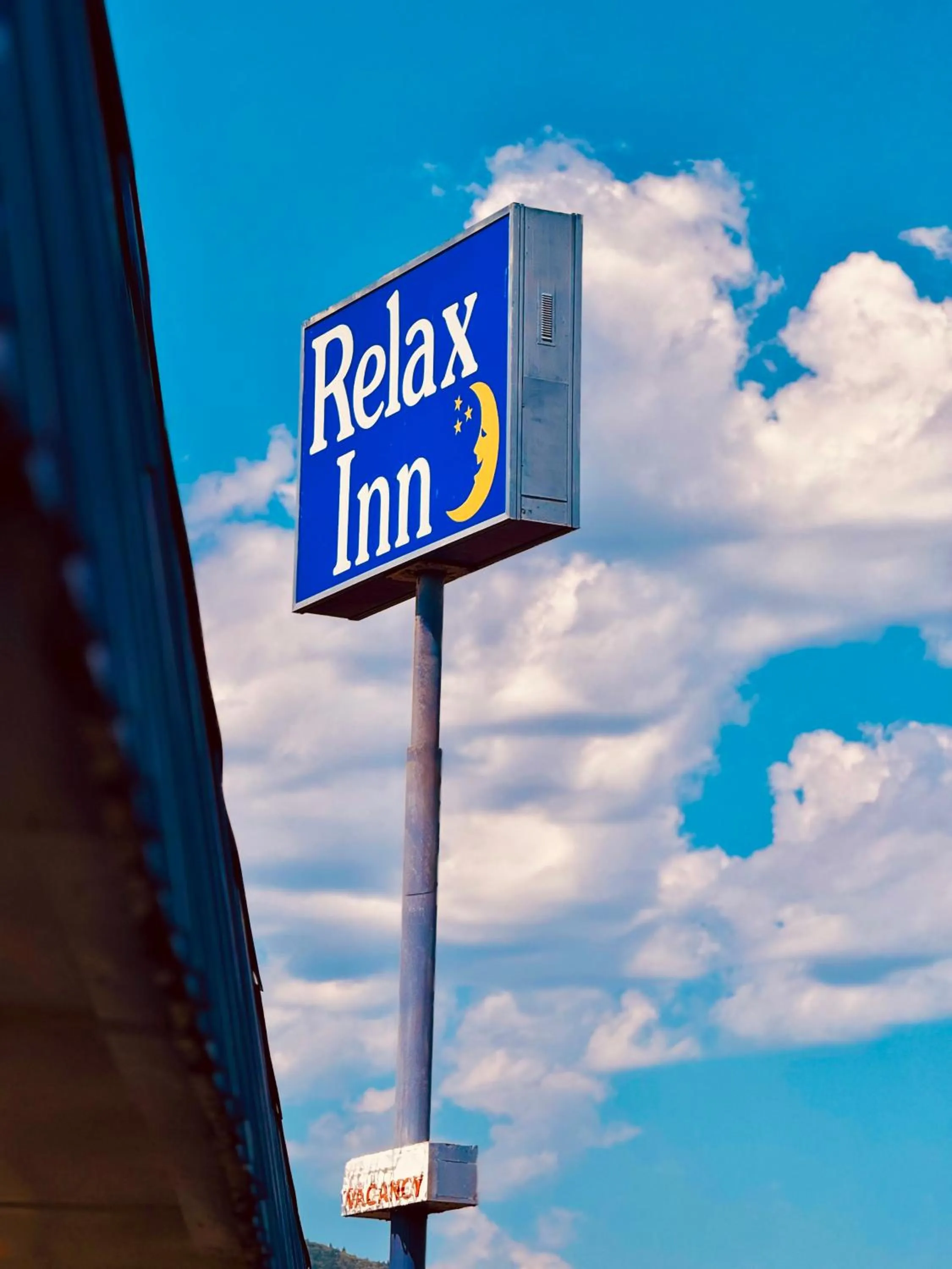 Property logo or sign in Relax Inn At Ashland