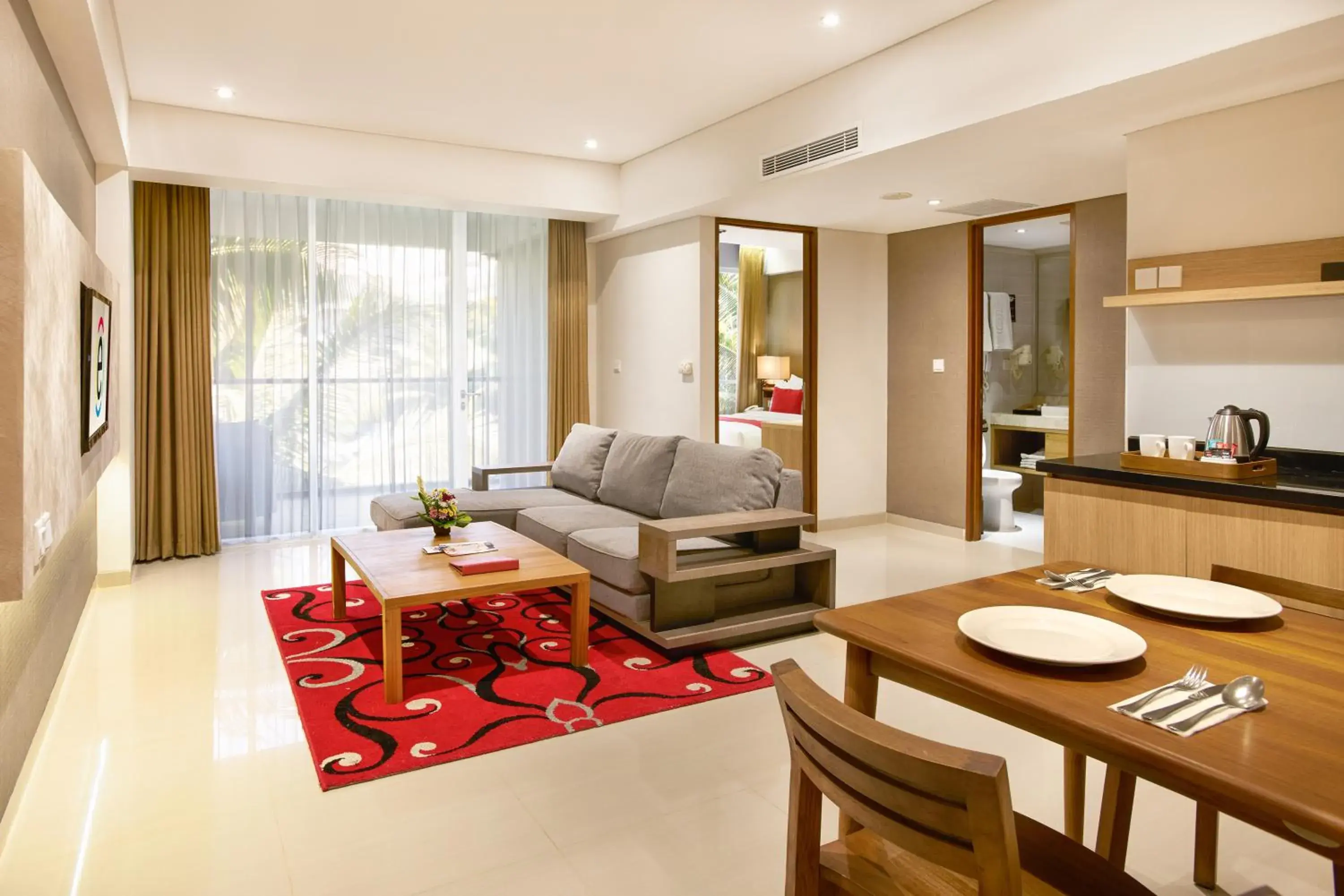 Living room in Ramada Encore by Wyndham Bali Seminyak Living room in Ramada Encore by Wyndham Bali Seminyak