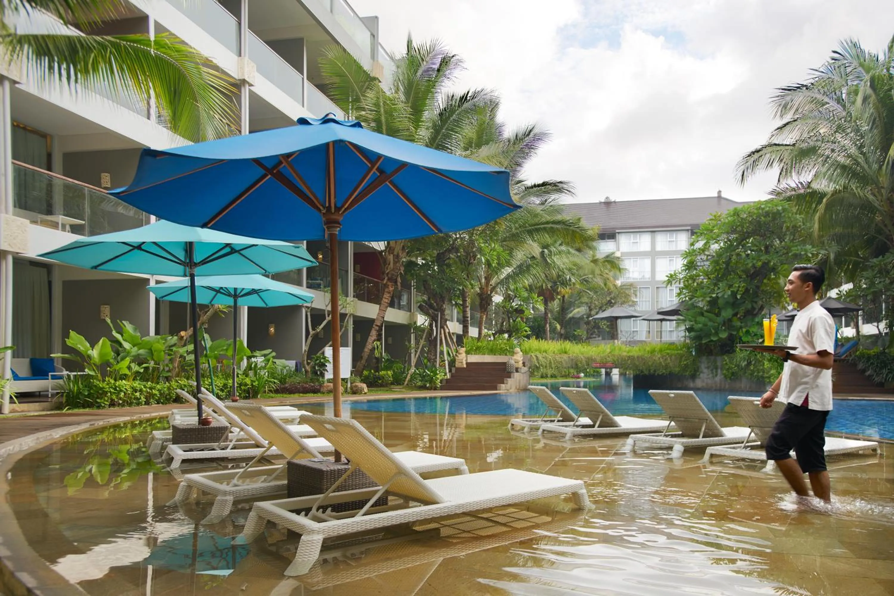 Swimming pool in Ramada Encore by Wyndham Bali Seminyak