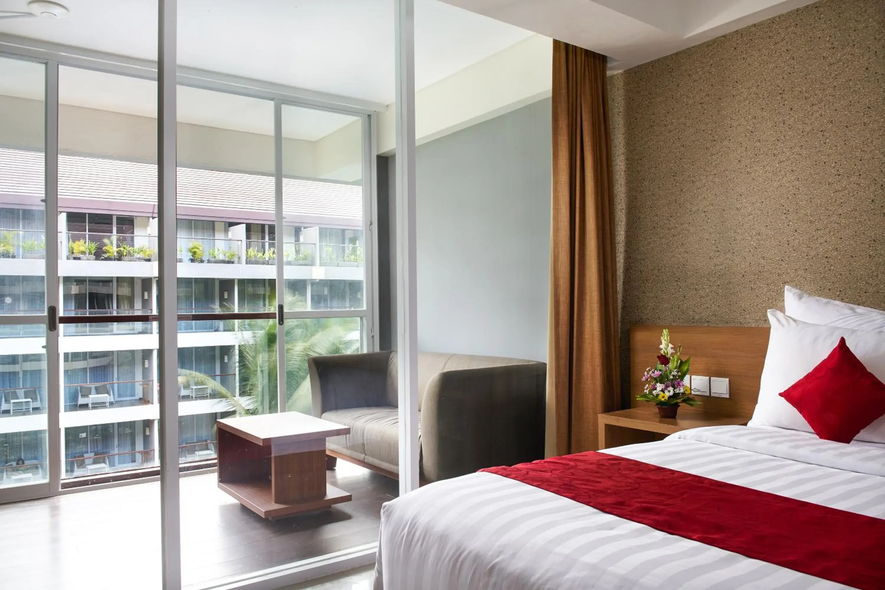 Pool view, Bed in Ramada Encore by Wyndham Bali Seminyak Pool view, Bed in Ramada Encore by Wyndham Bali Seminyak