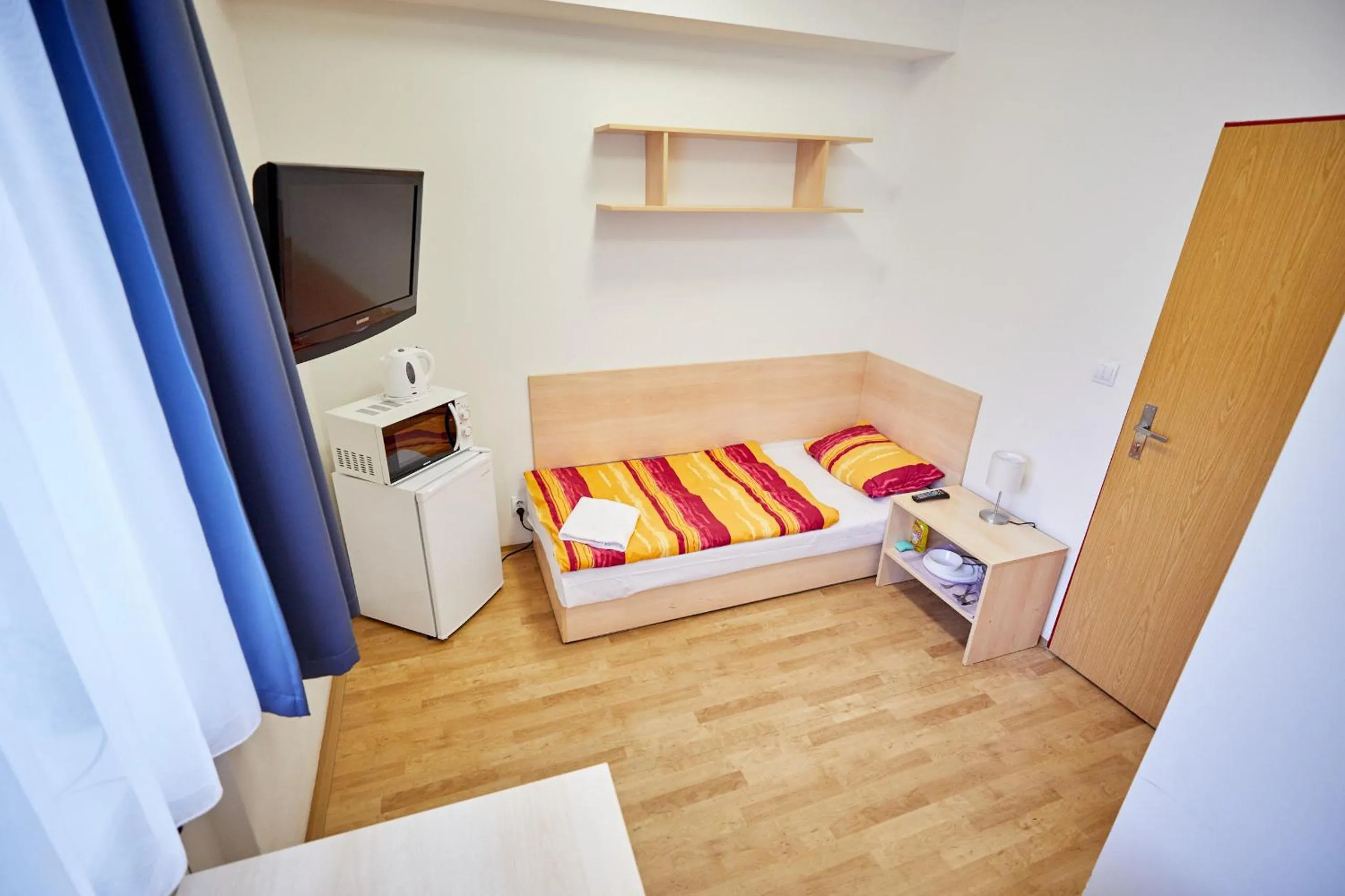 TV and multimedia, Bed in University Hotel