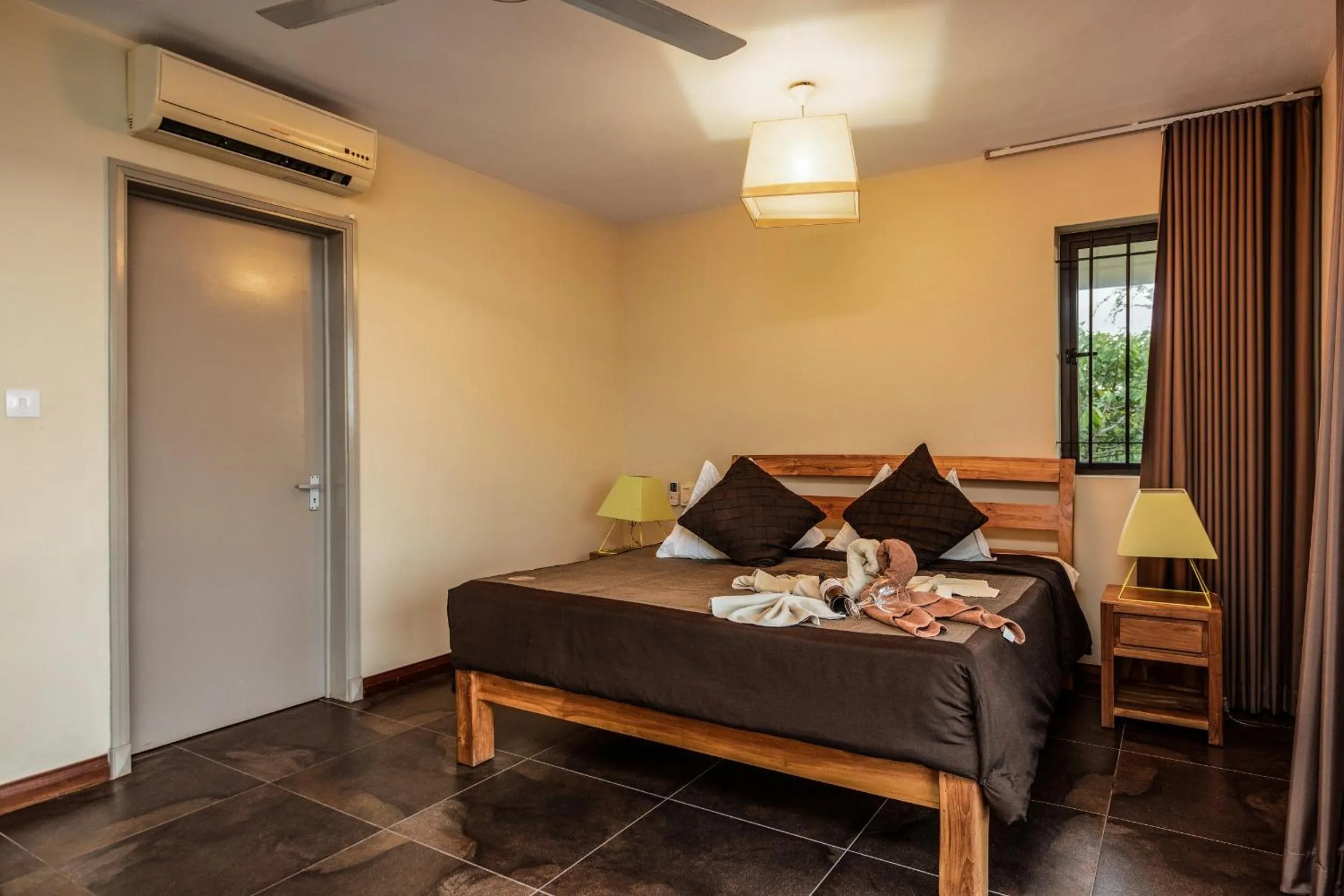Bed in Happy Days Guest House