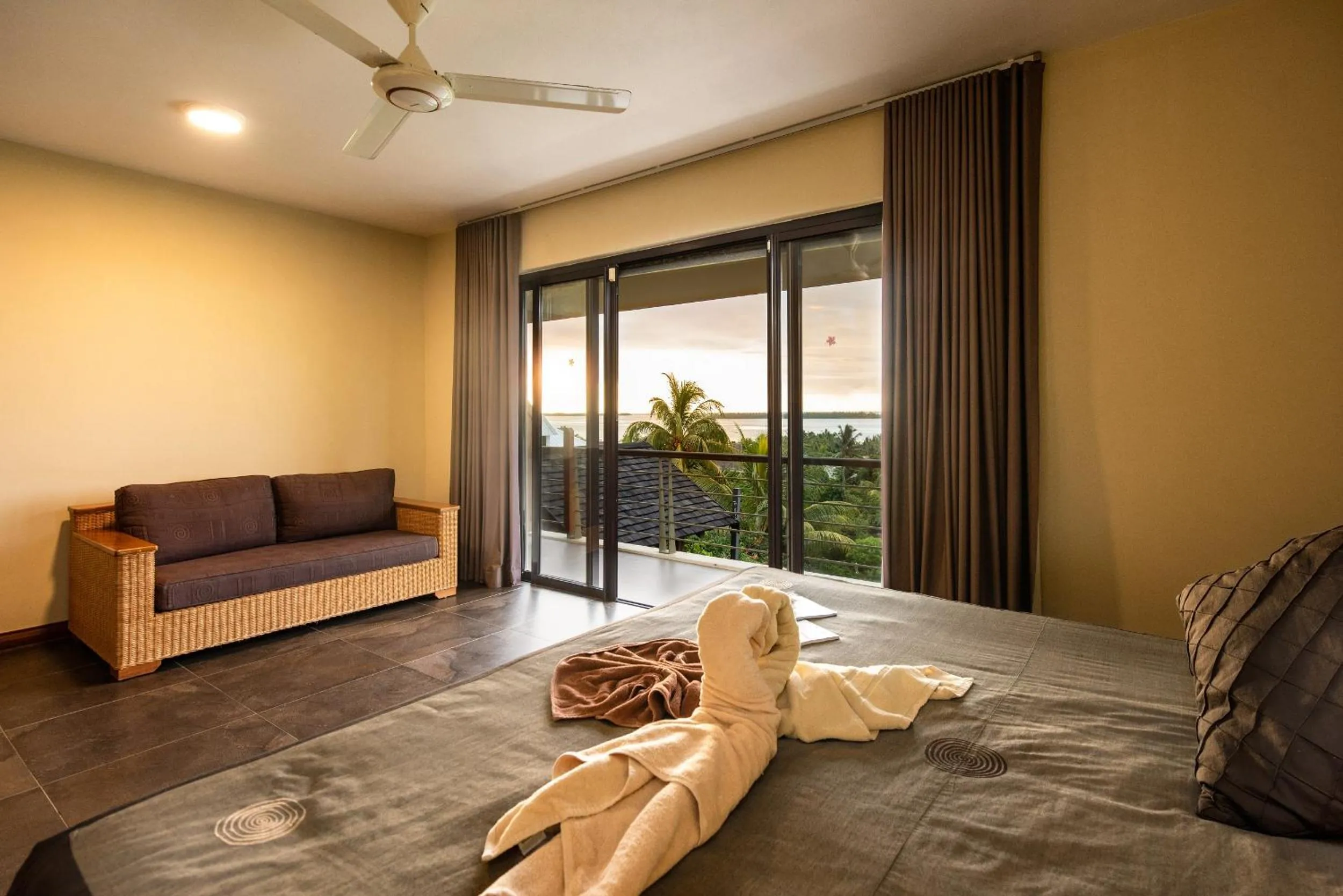 Seating area, Bed in Happy Days Guest House