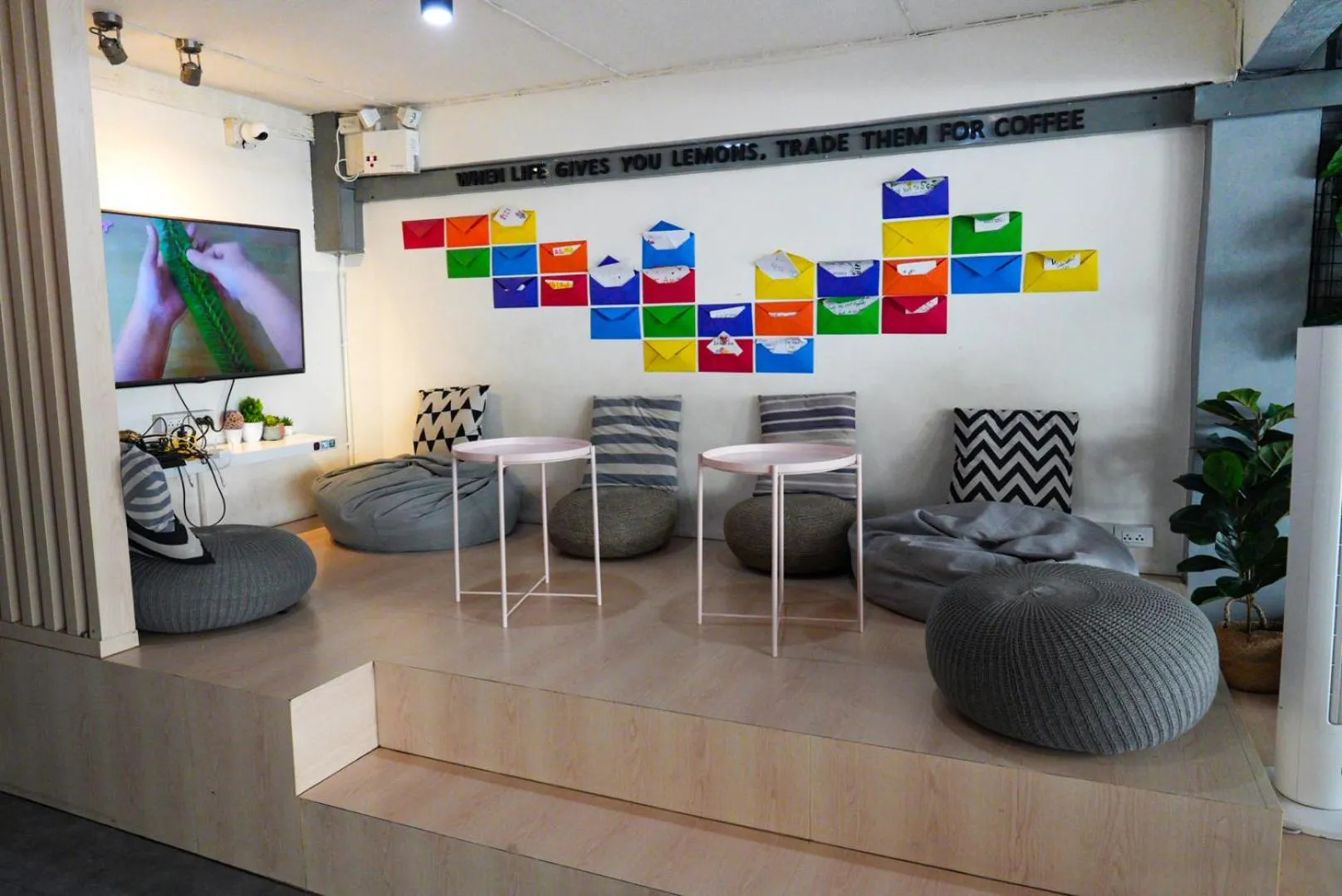 Communal lounge/ TV room in Everyday Bangkok Hostel