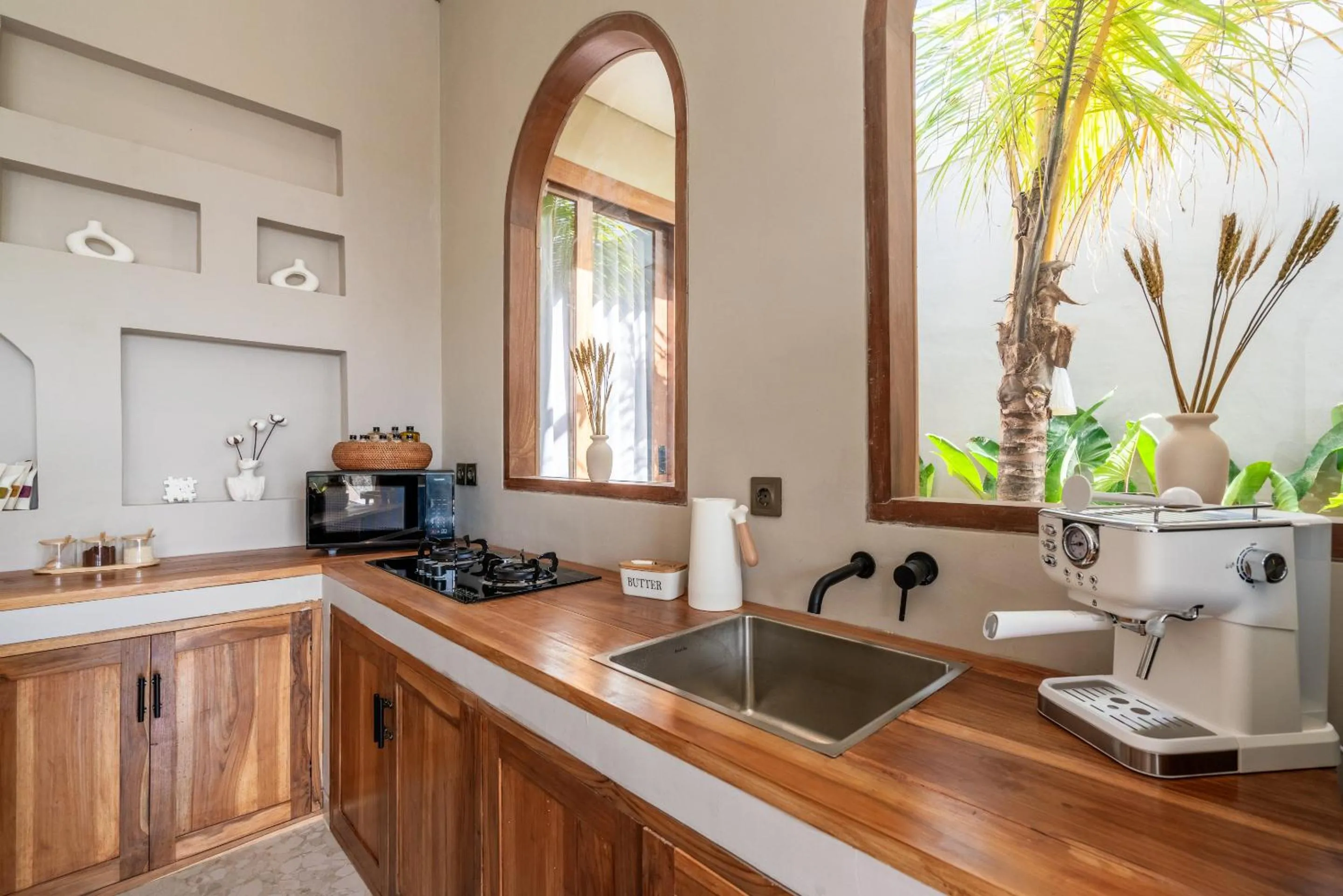 Kitchen or kitchenette in Villa Bayu by Alfred in Bali