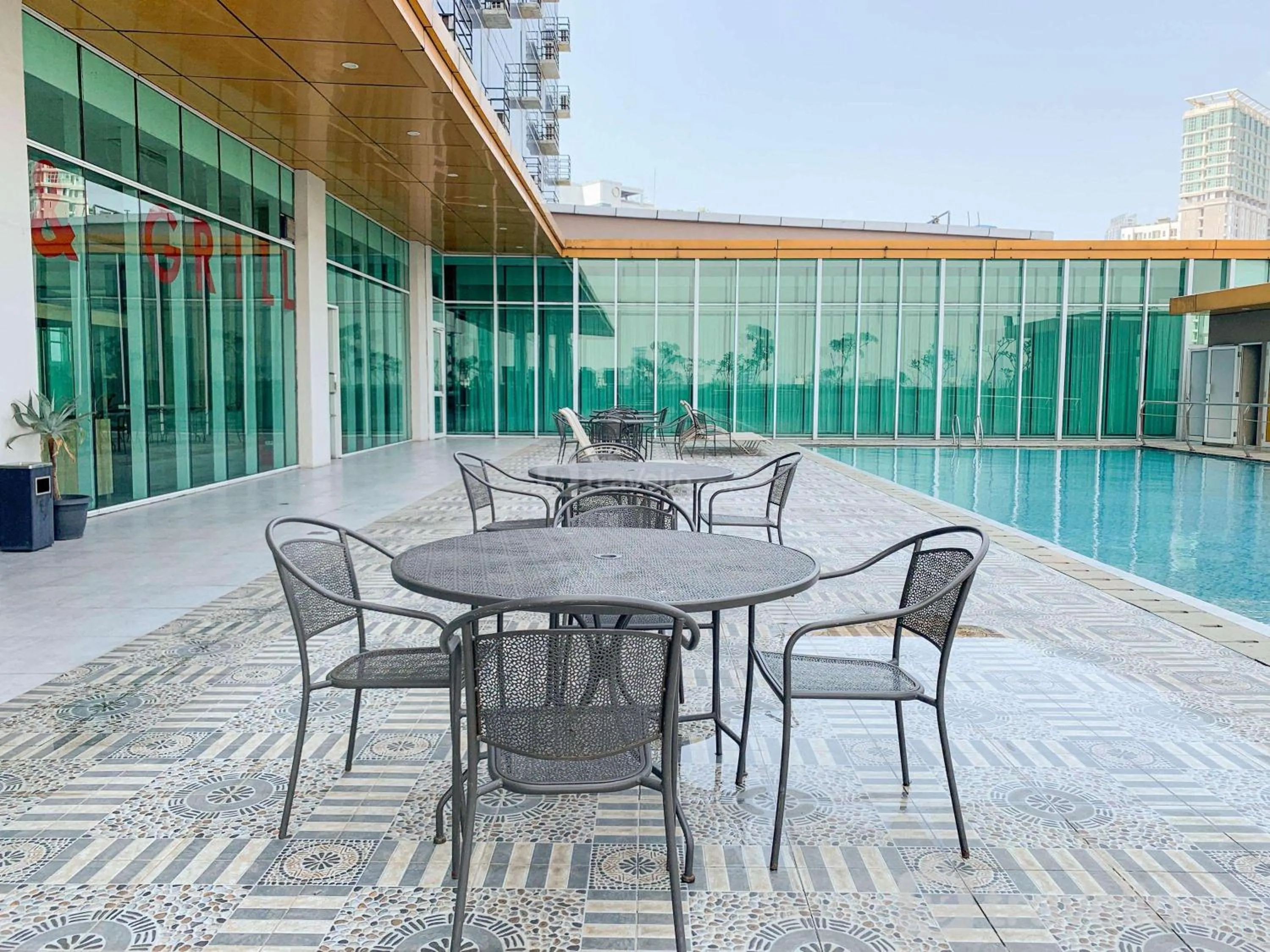 Property building in Fully Furnished with Comfortable Design 2BR Harco Mangga Besar Apartment By Travelio