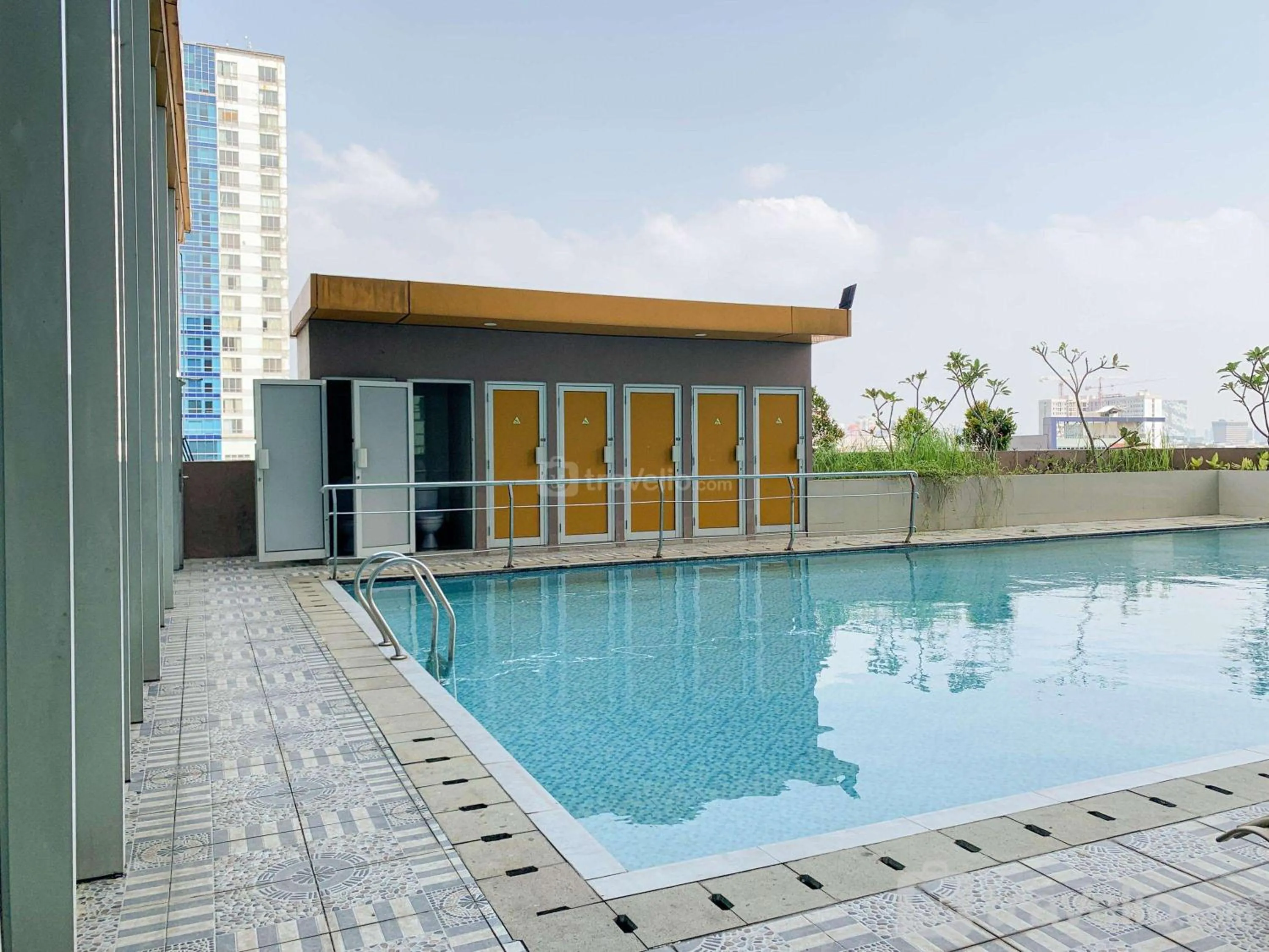 Property building in Fully Furnished with Comfortable Design 2BR Harco Mangga Besar Apartment By Travelio