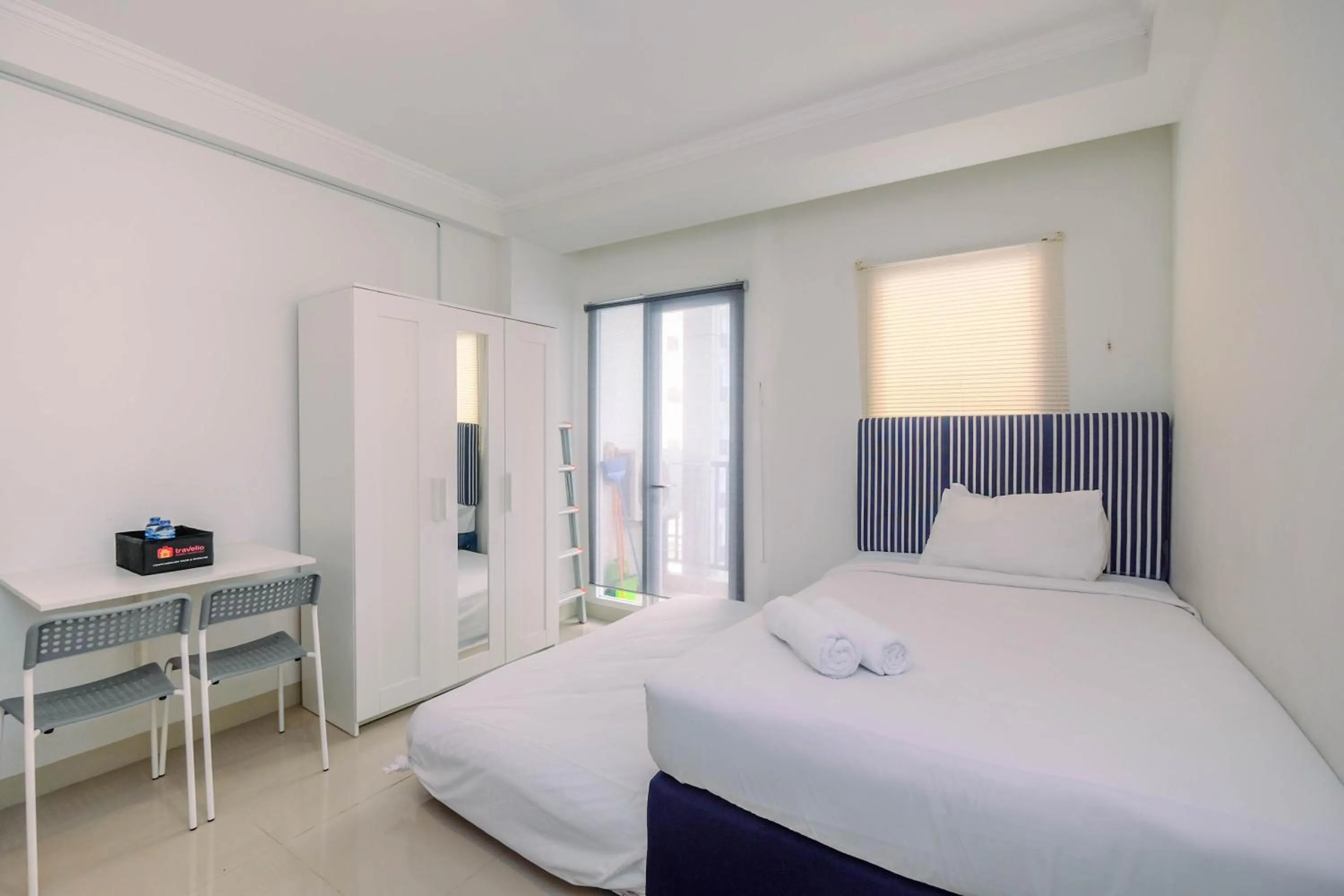 Bedroom, Bed in Simply Clean and Spacious Studio Signature Park Grande Apartment By Travelio