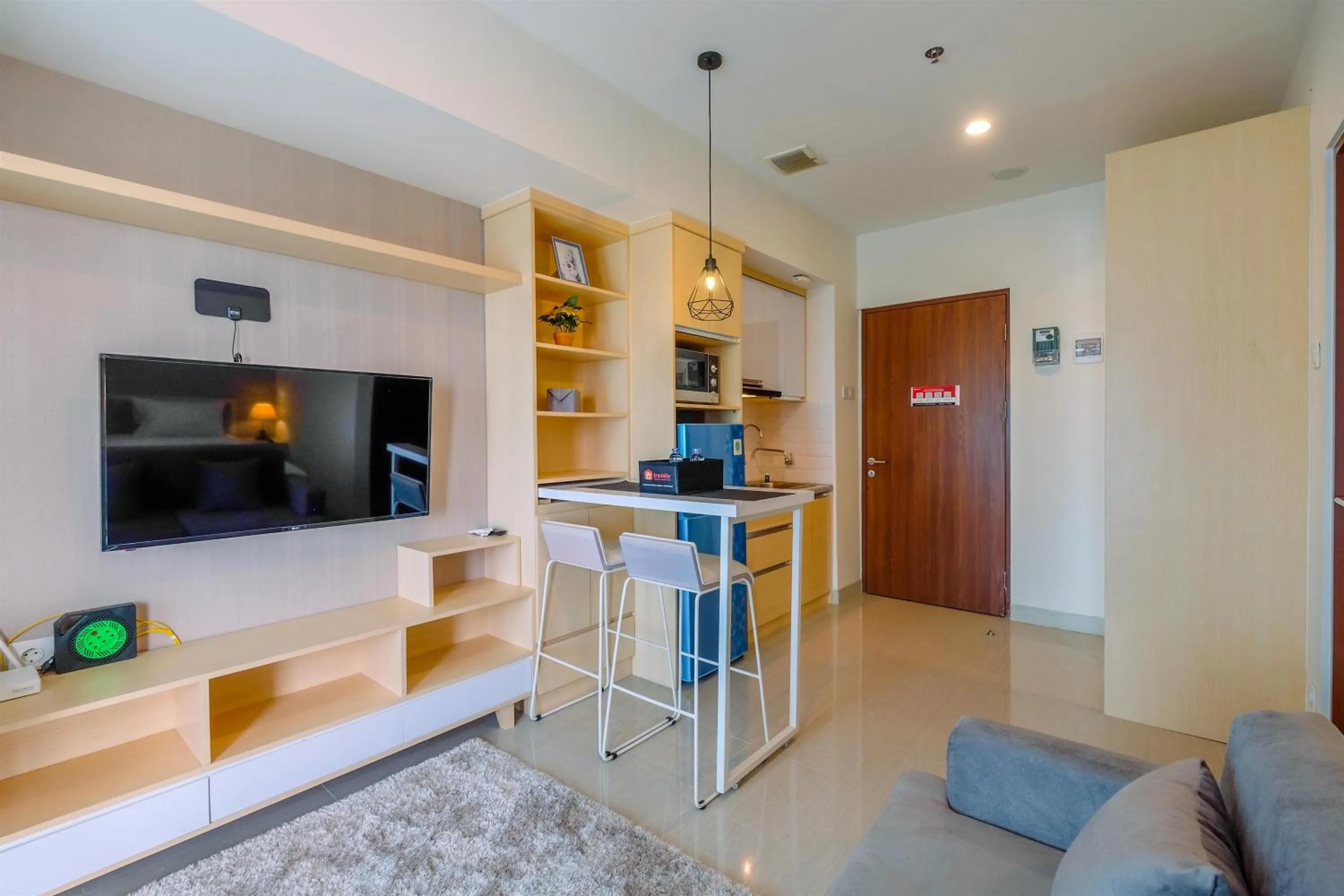 Cozy and Great Choice Studio at Grand Kamala Lagoon Apartment By Travelio