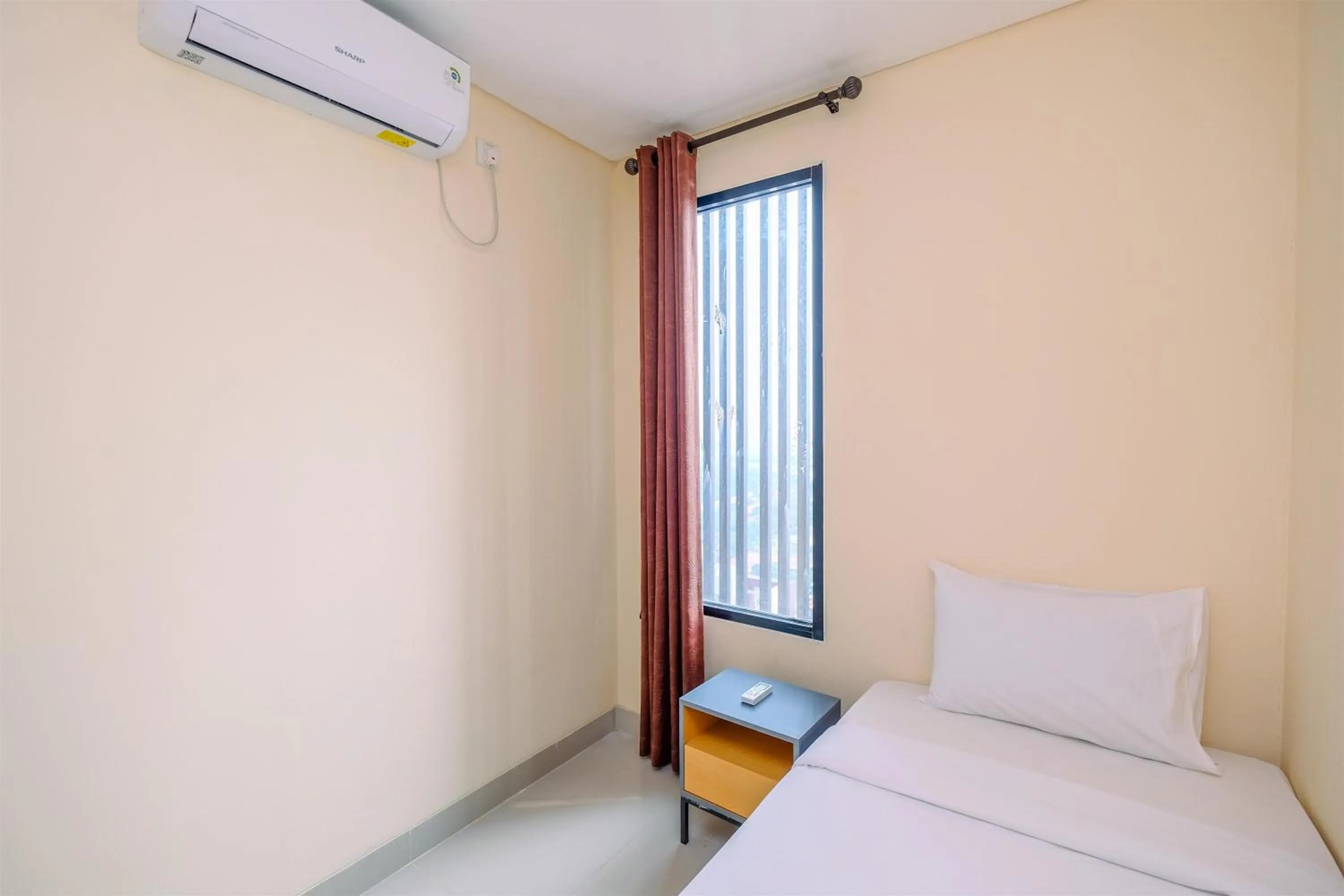 Bed in 2BR Best Rate Kebayoran Icon Apartment near Gandaria City By Travelio