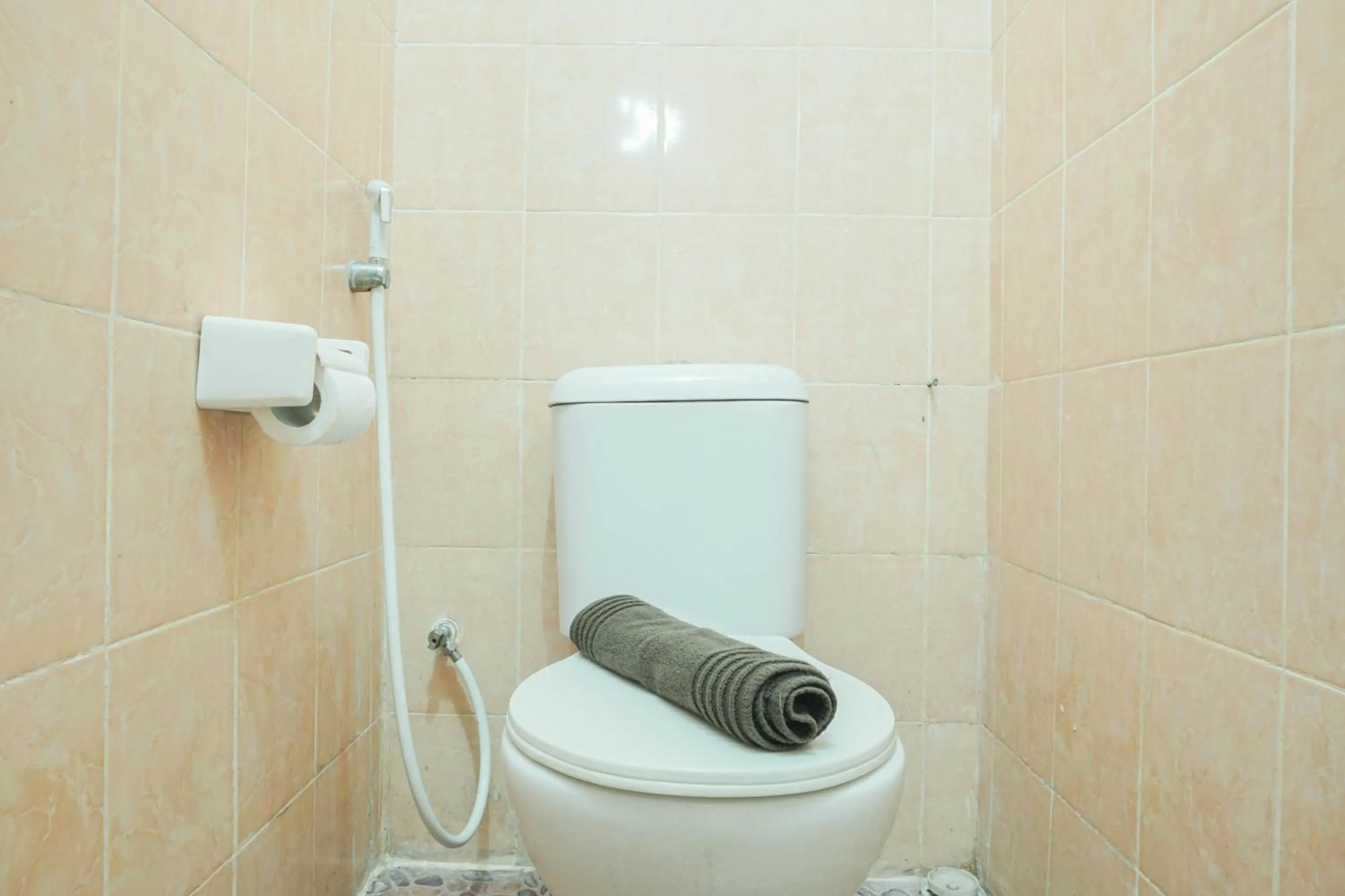 Bathroom in Comfy and Strategic 2BR at Menteng Square Apartment By Travelio