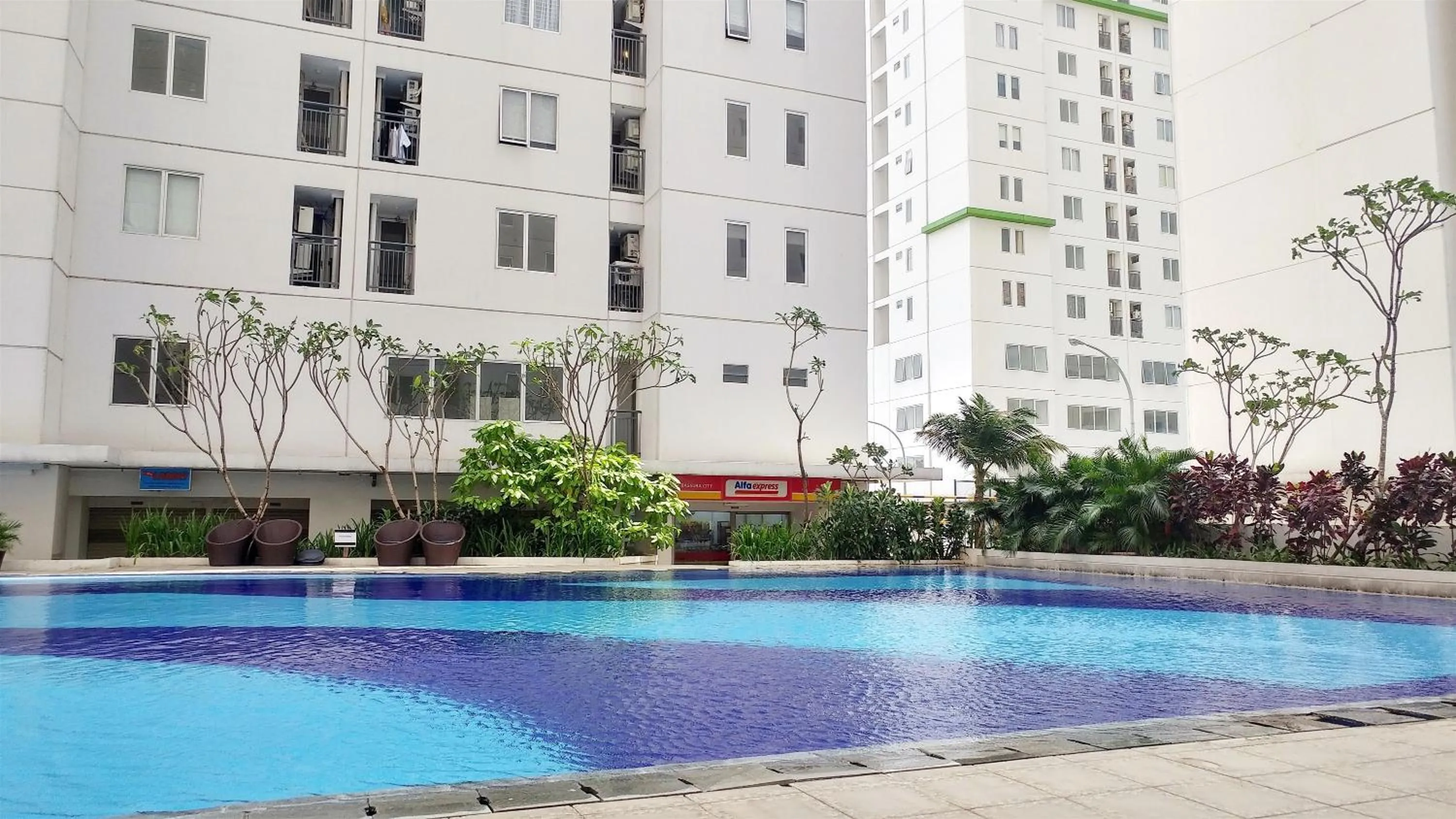 Property building in Elegant 2BR at Bassura City Apartment By Travelio