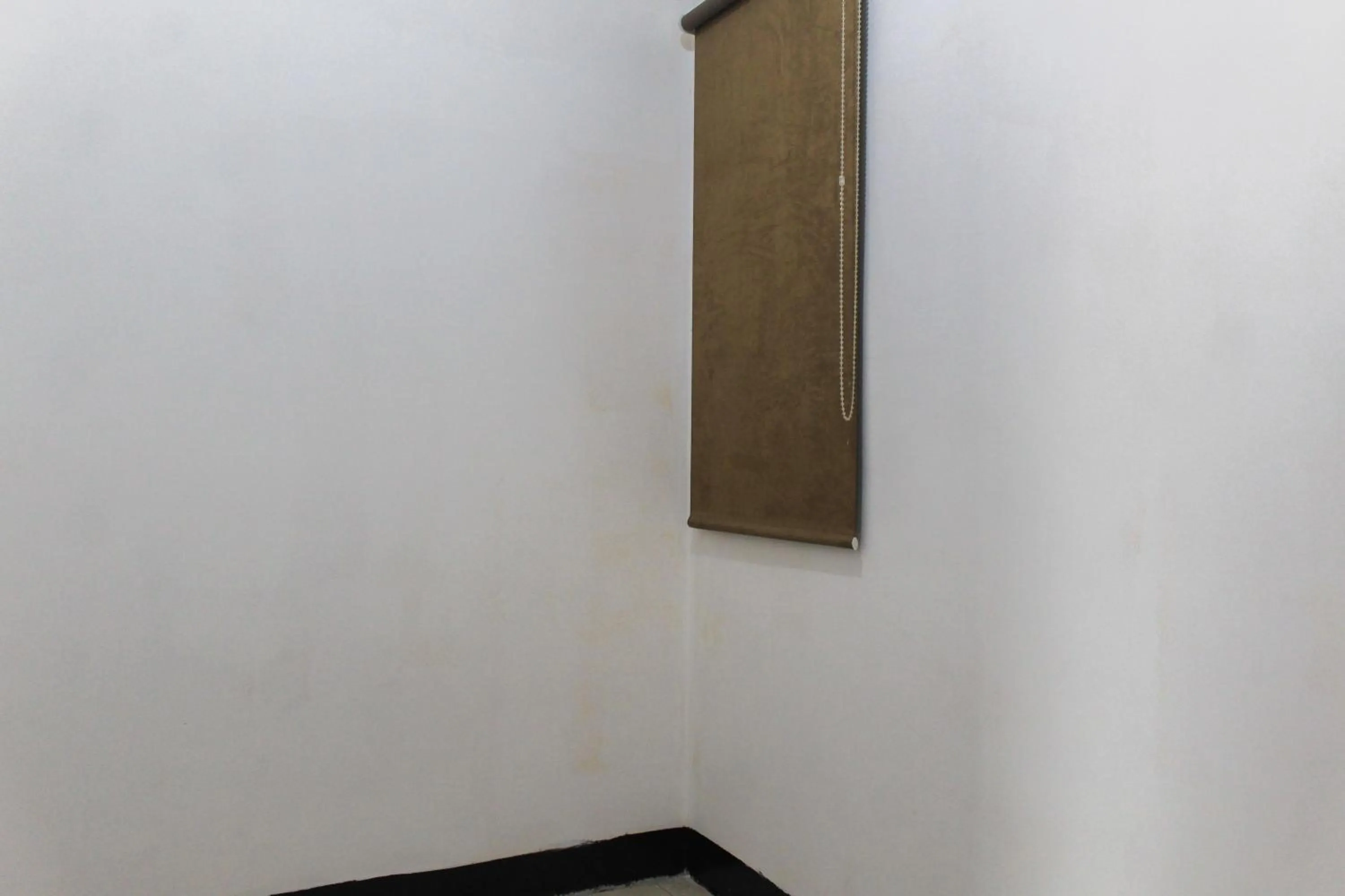 Best Price 1BR with Extra Room at Menara Latumenten Apartment Grogol By Travelio