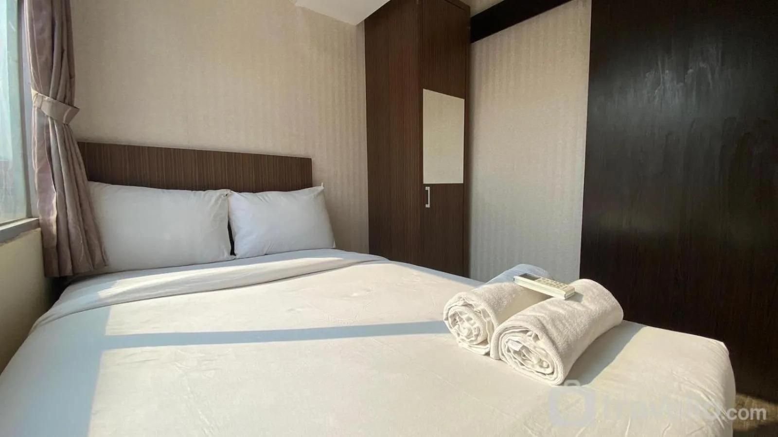Lower Floor and Simply Modern 2BR Apartment at The Jarrdin Cihampelas By Travelio