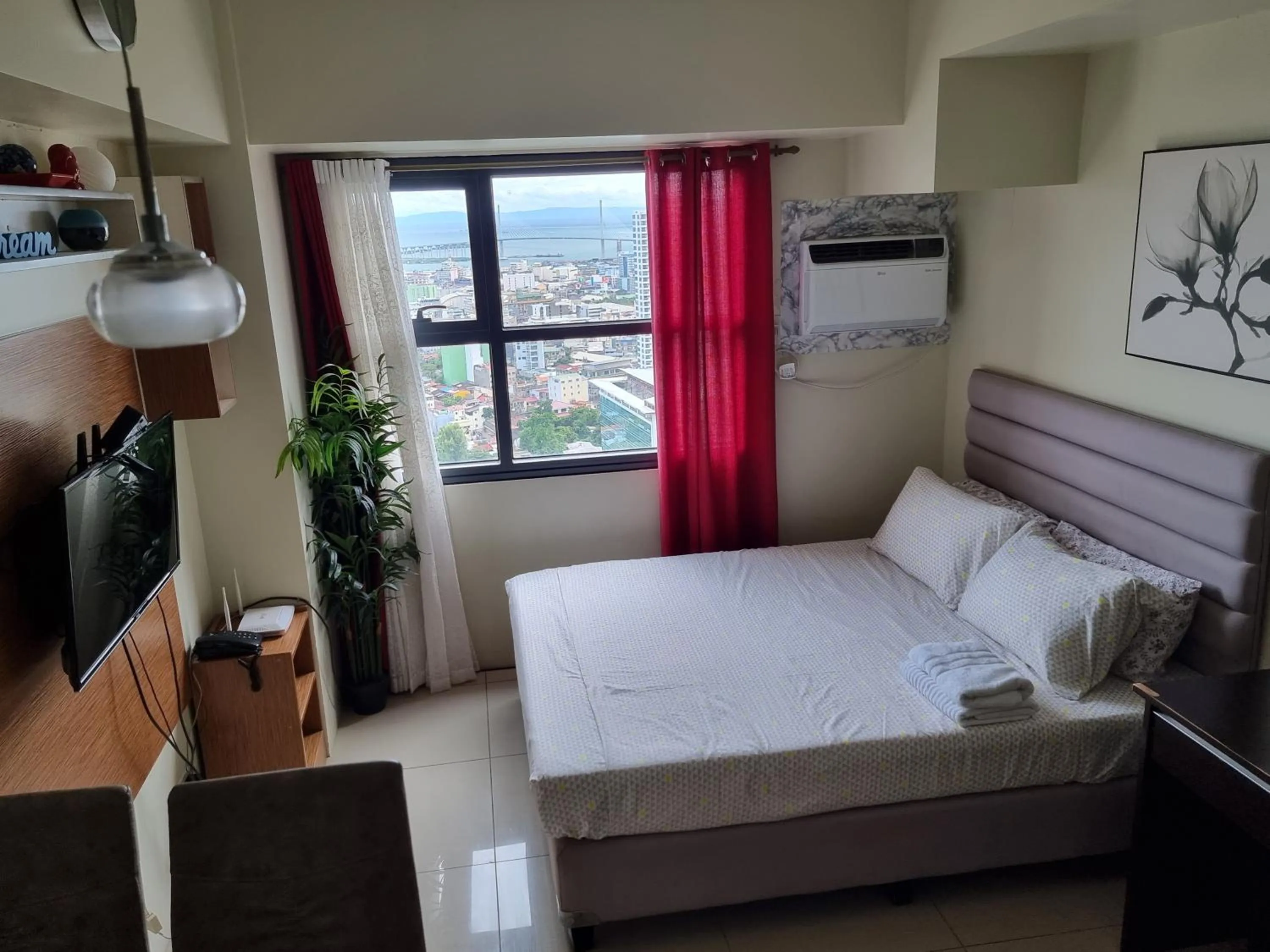 Bed in Studio Condo Unit at Horizons 101