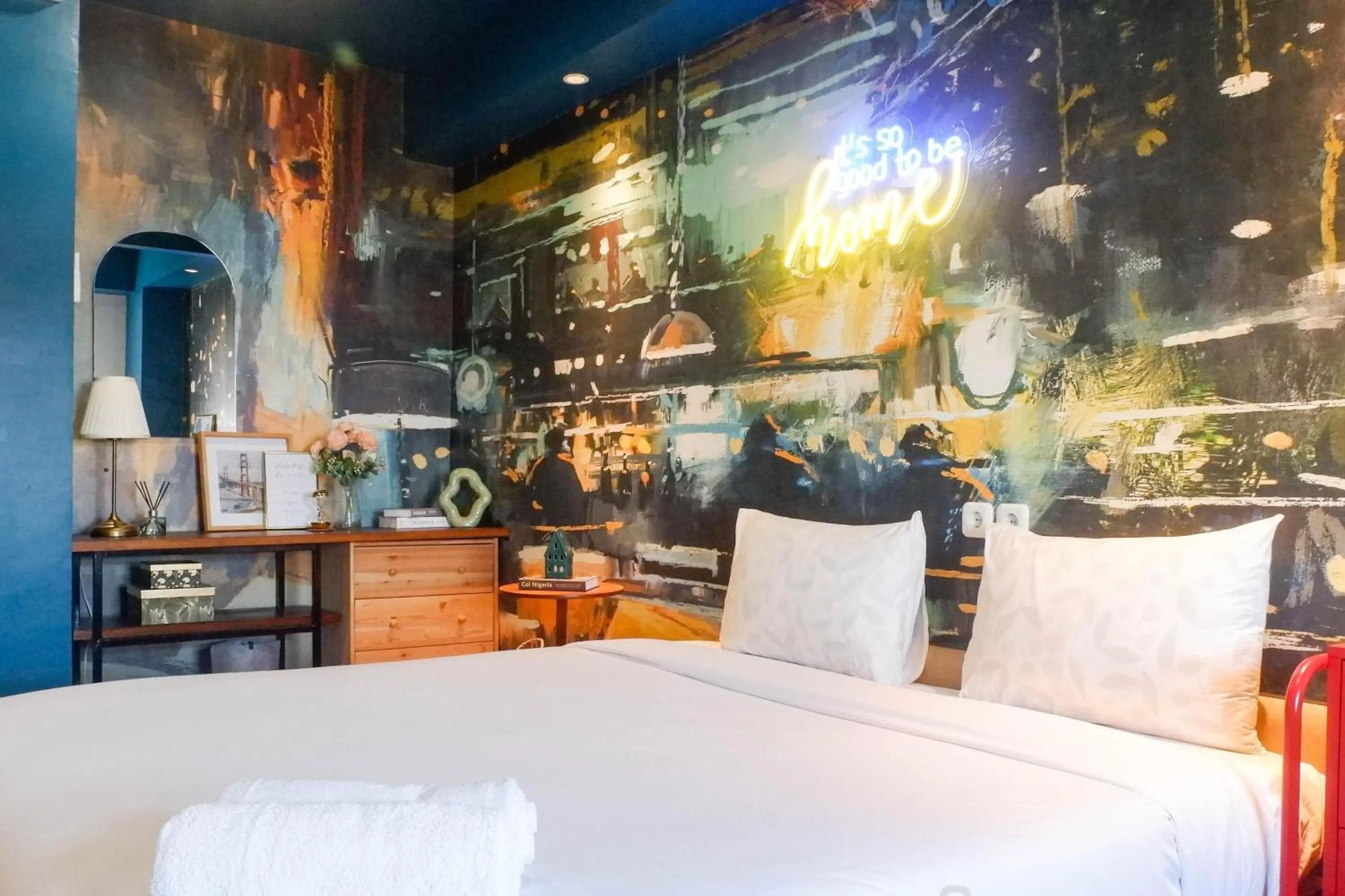 Bed in Exquisite 1BR Apartment at Puri Mas By Travelio