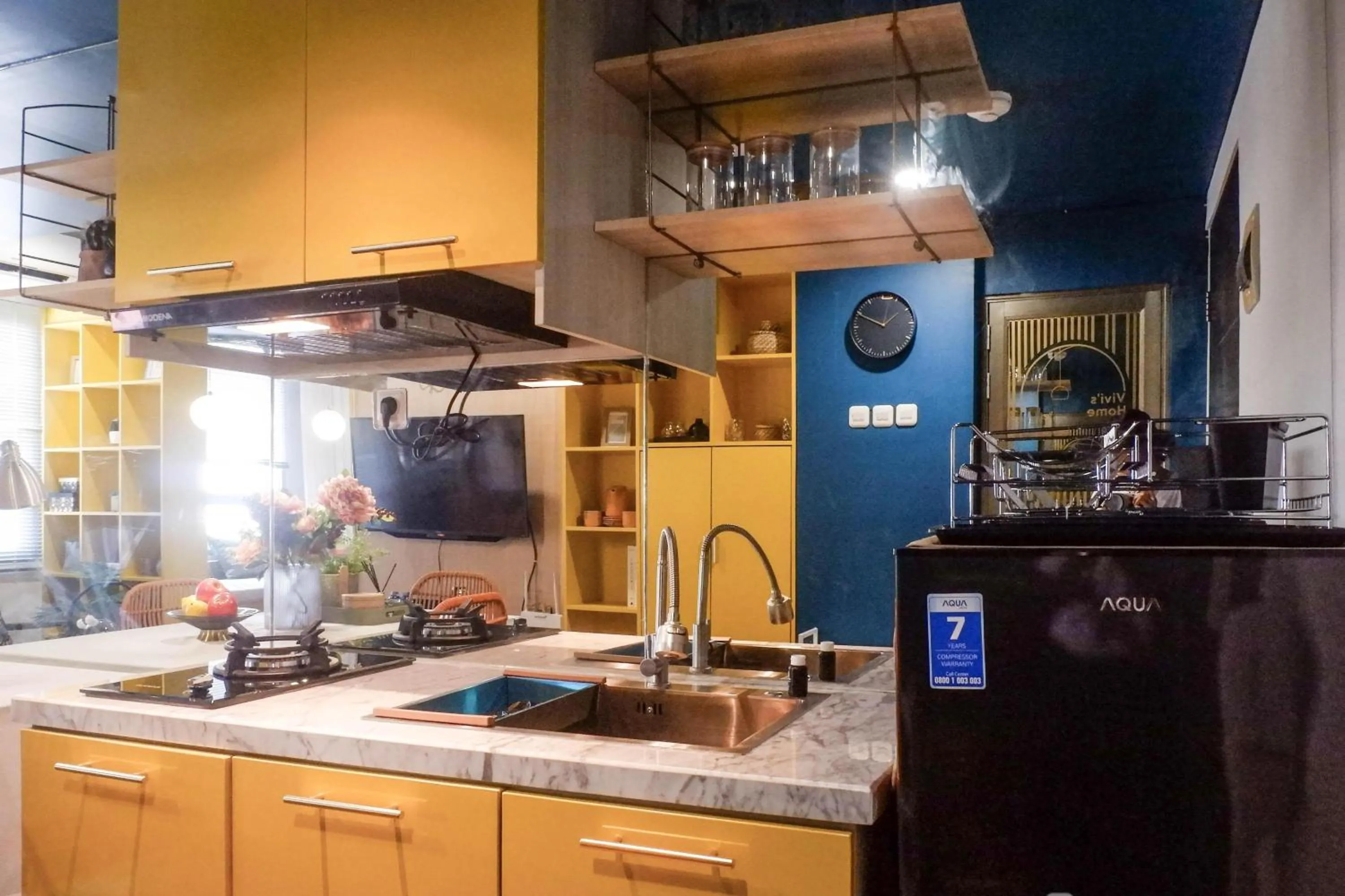 Kitchen or kitchenette in Exquisite 1BR Apartment at Puri Mas By Travelio