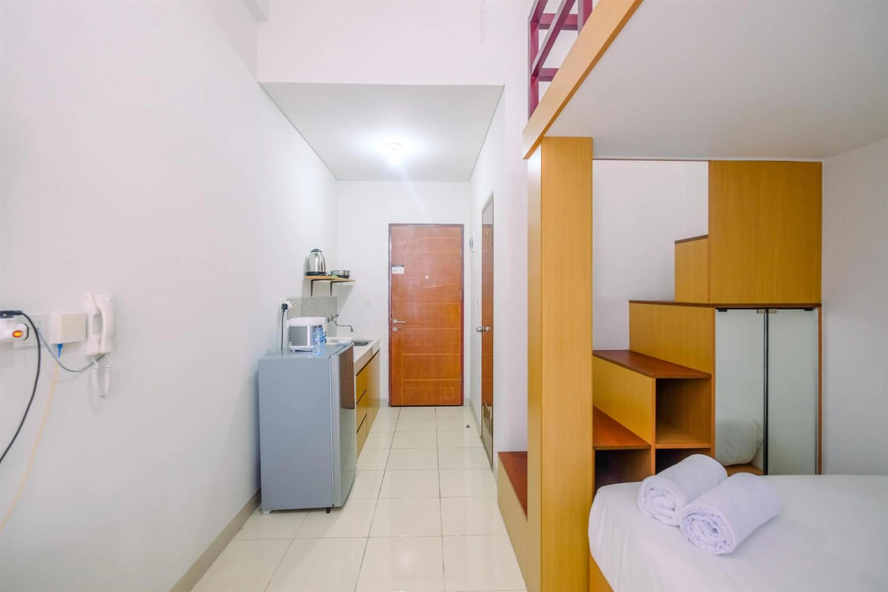 Bed in Great Deal Studio at Dave Apartment near Campus By Travelio