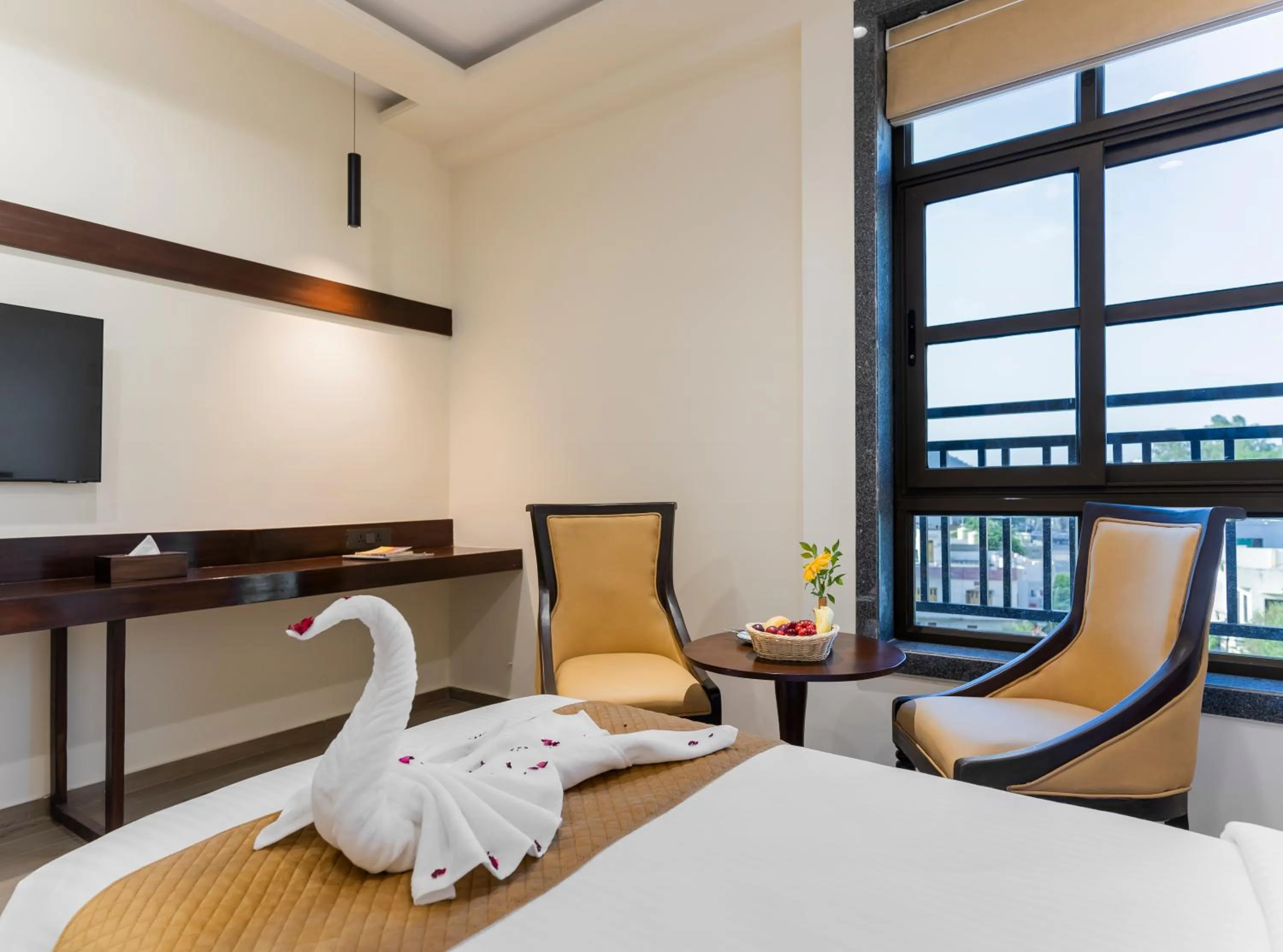 Bed in The Belita Hotel & Spa