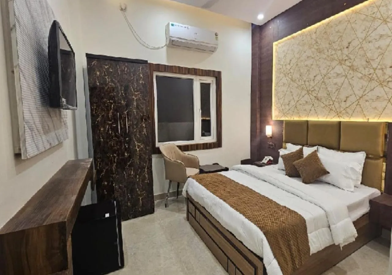 Bed in Triveni International