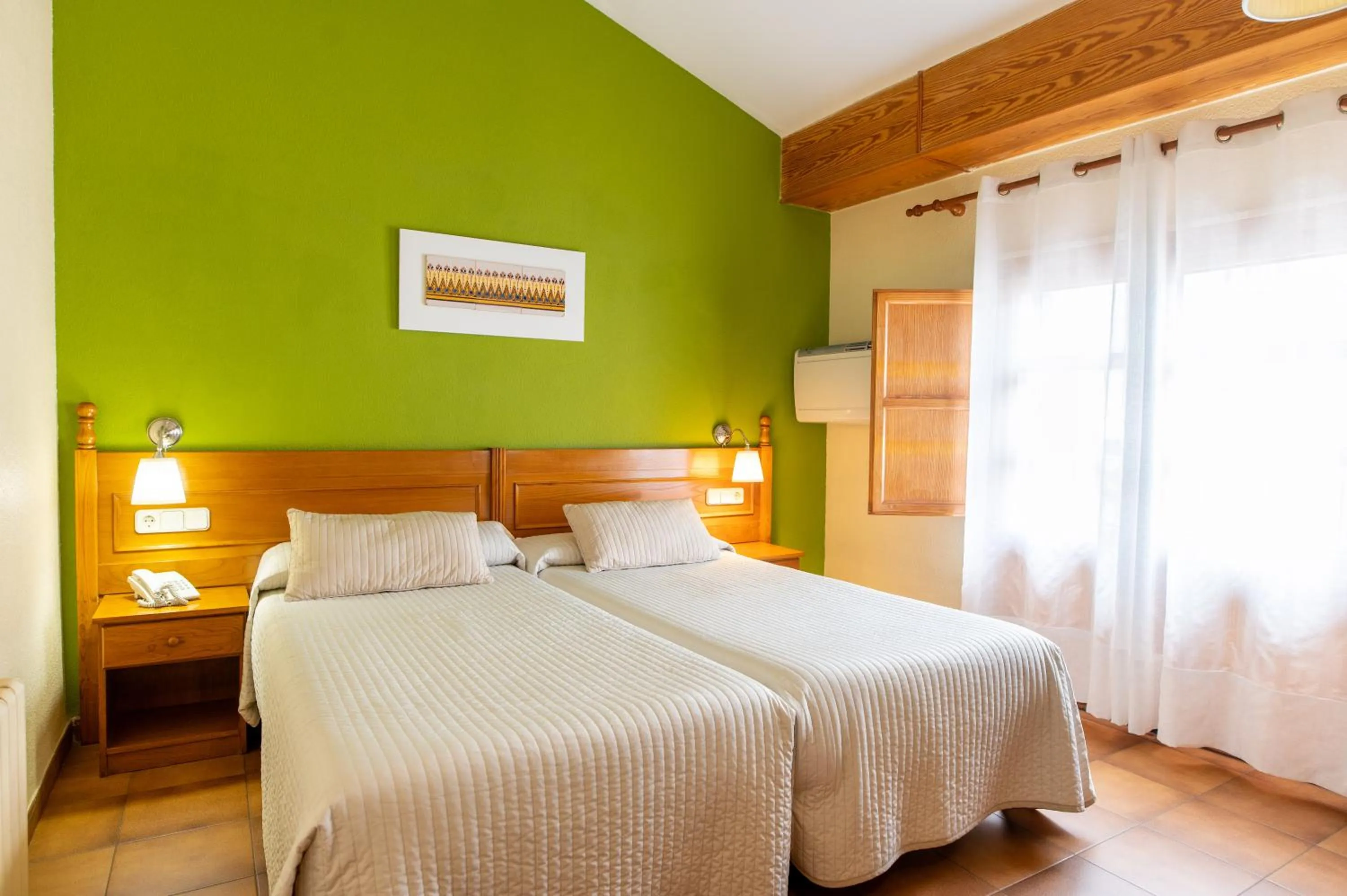 Bed in Hotel Rey Don Jaime