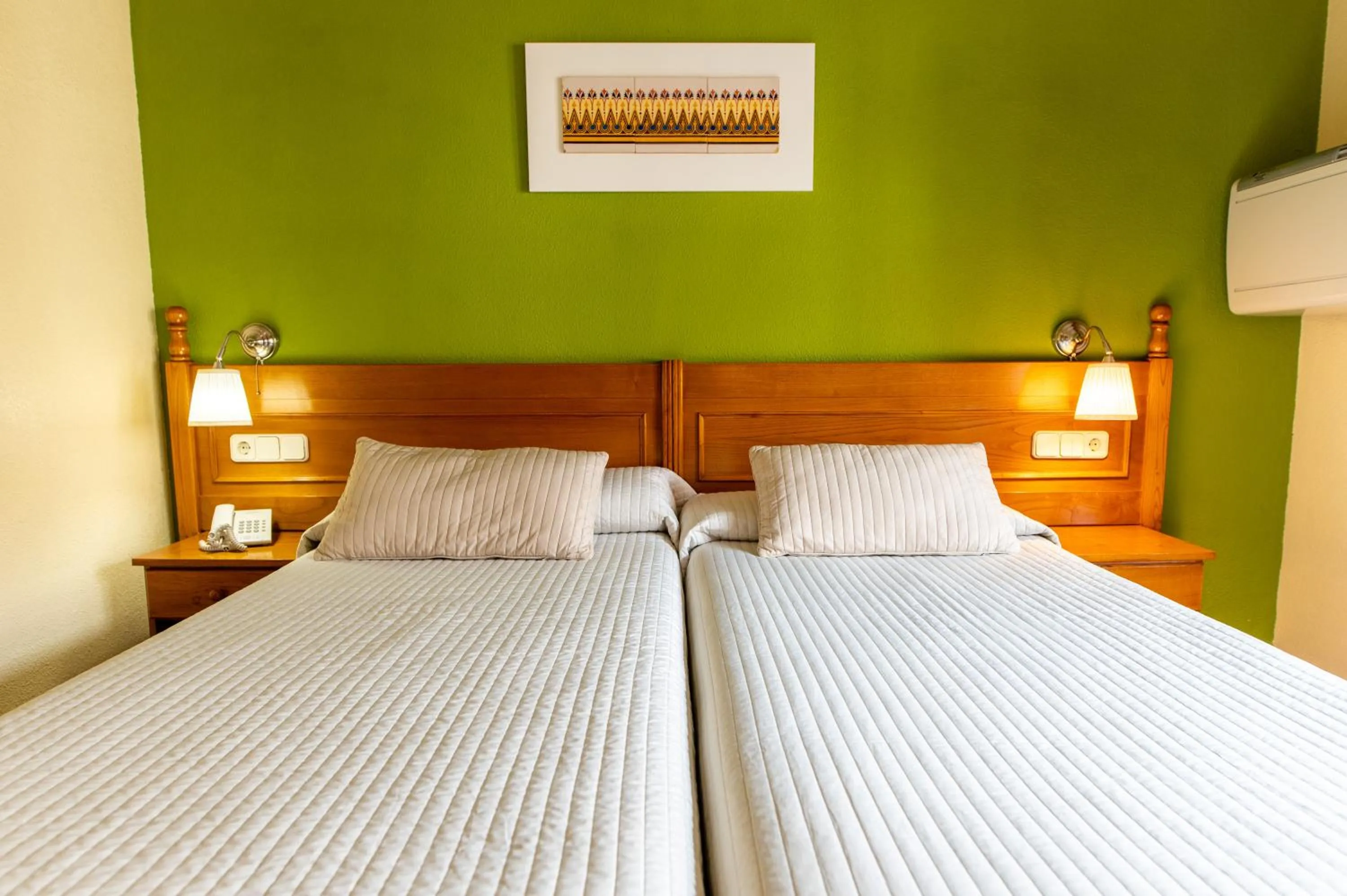 Bed in Hotel Rey Don Jaime