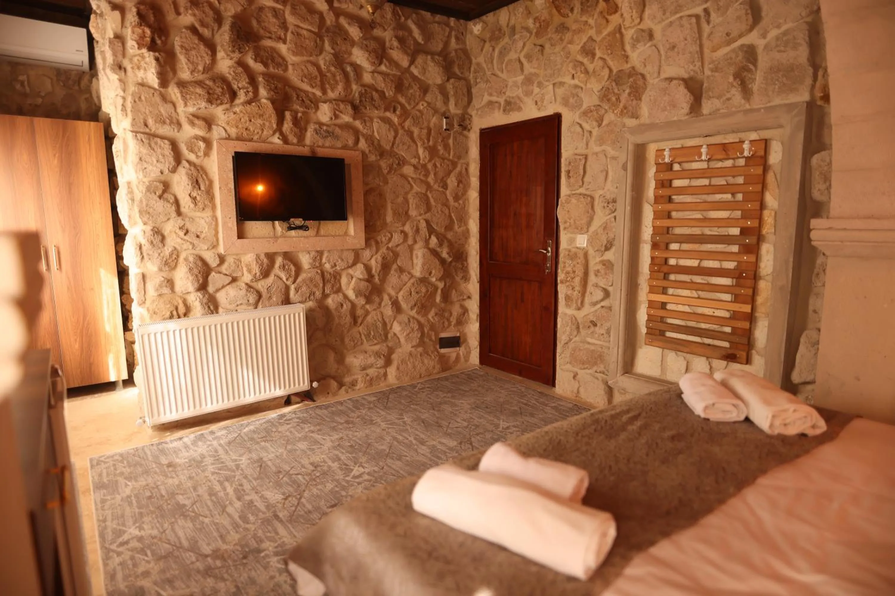 Bed in Wisstone Hotel