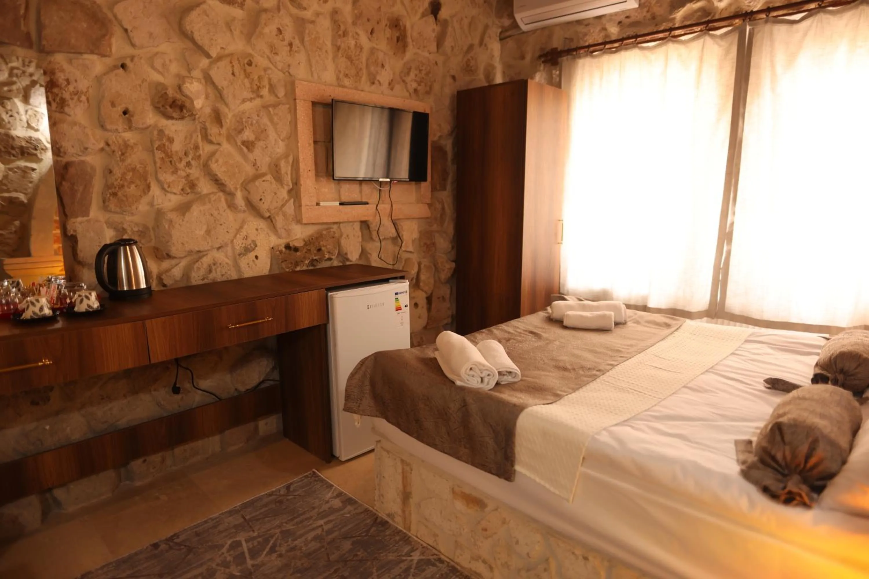 Bed in Wisstone Hotel