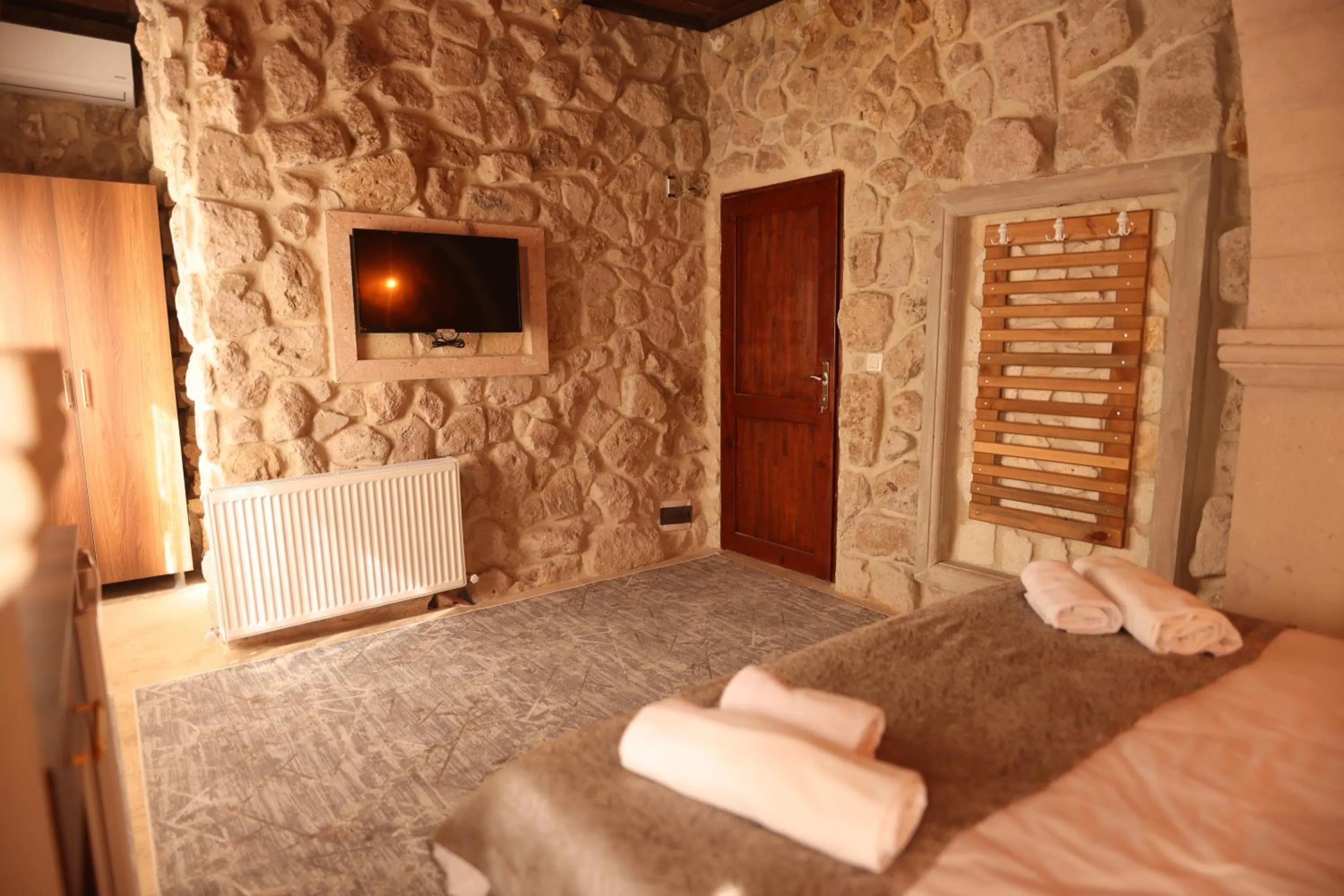 Bed in Wisstone Hotel