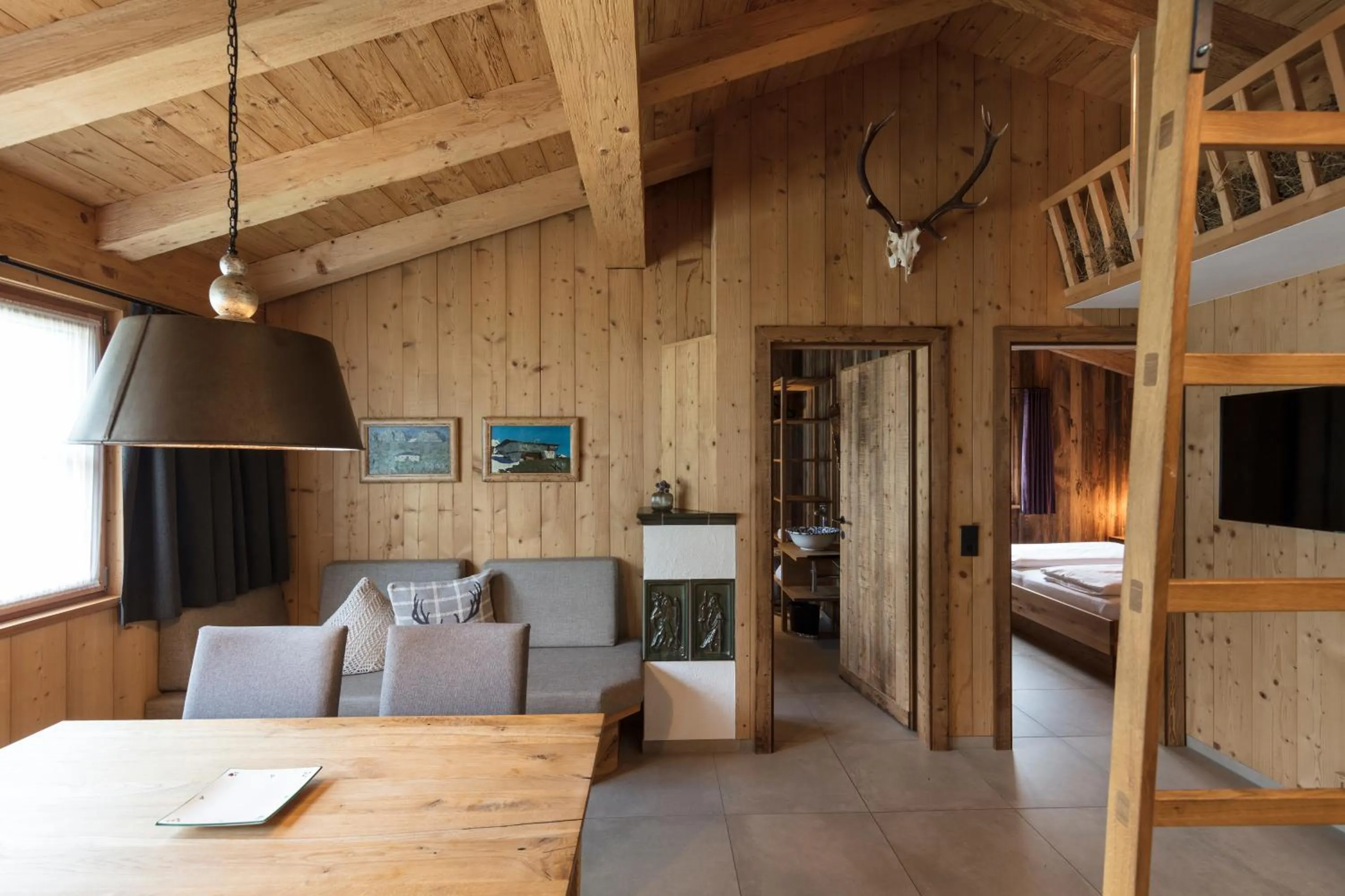 Living room, Bed in ArlBerglife Ferienresort