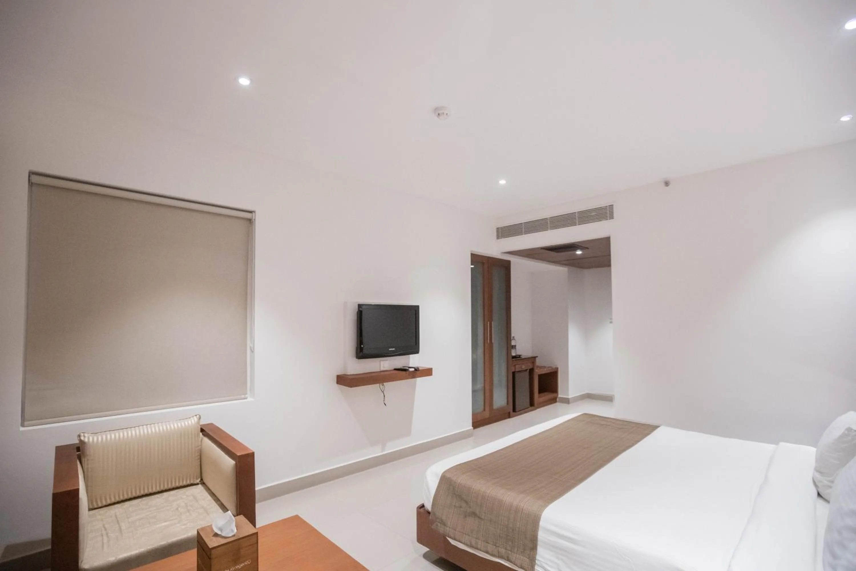 Bed in Hotel Niya Regency