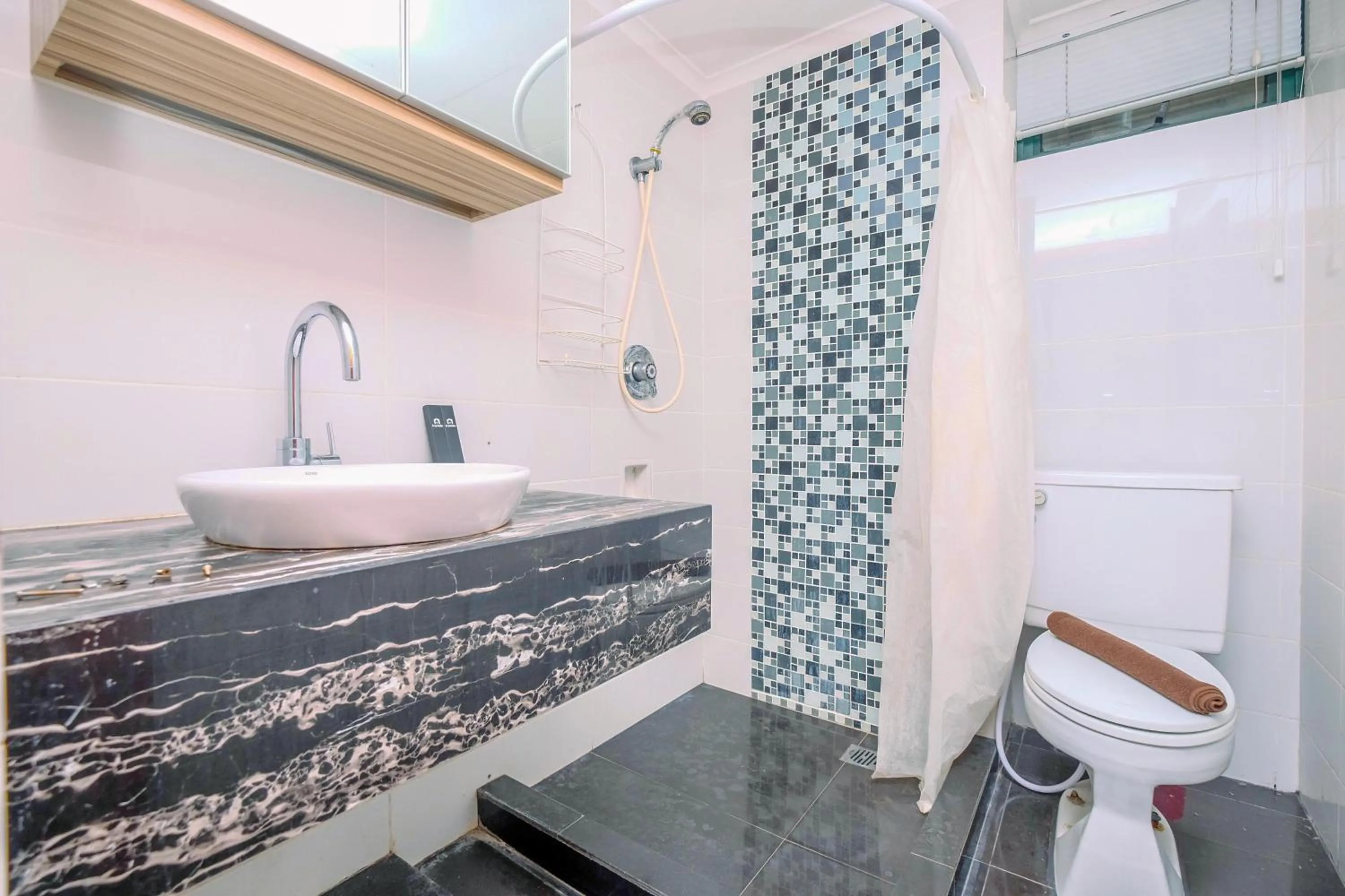 Comfort 2BR + Extra Room at Sudirman Tower Condominium Apartment By Travelio