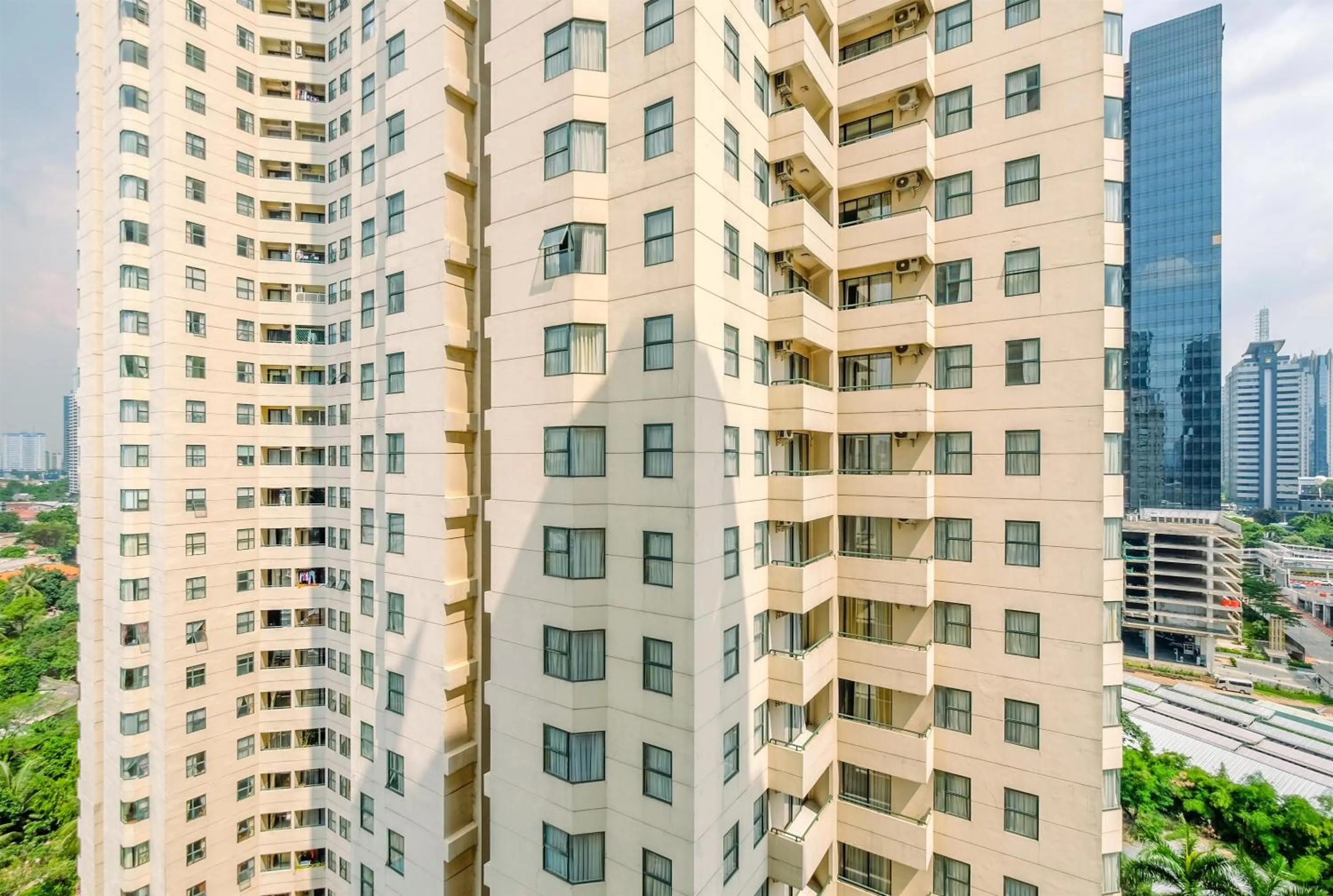 Comfort 2BR + Extra Room at Sudirman Tower Condominium Apartment By Travelio