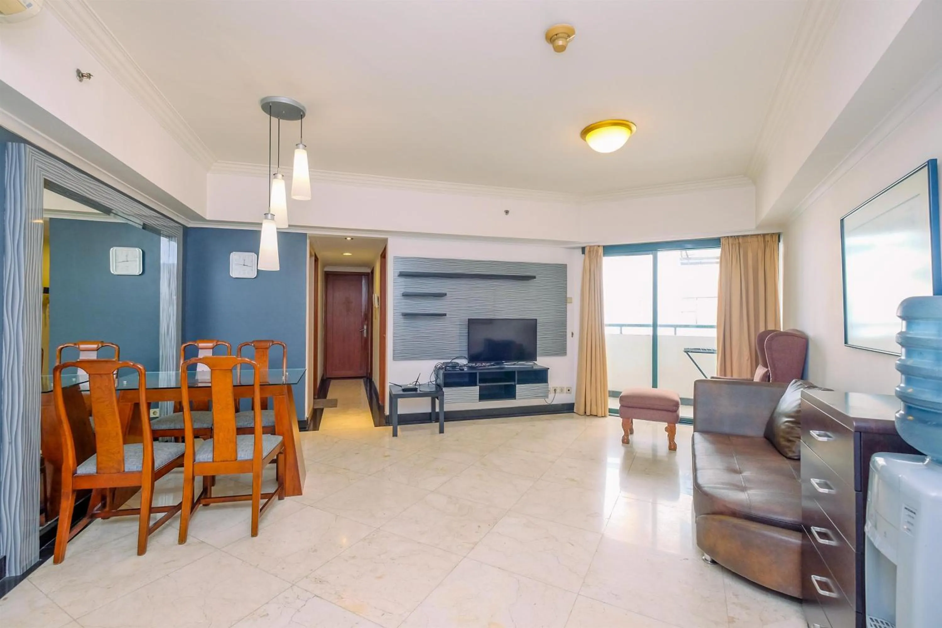 Comfort 2BR + Extra Room at Sudirman Tower Condominium Apartment By Travelio