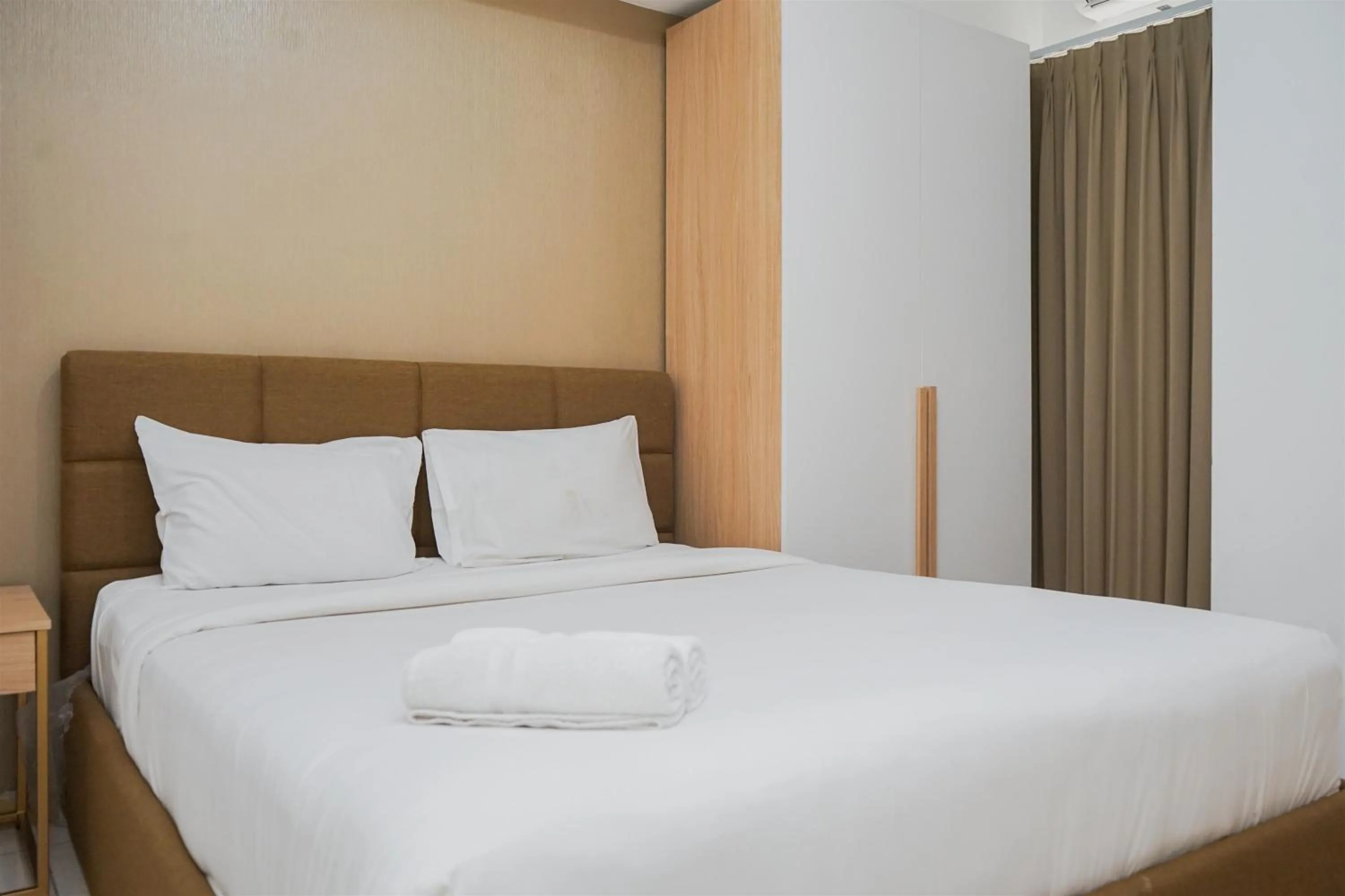 Two-Bedroom Apartment in Nice and Comfy 2BR Apartment at M-Town Residence near Summarecon By Travelio